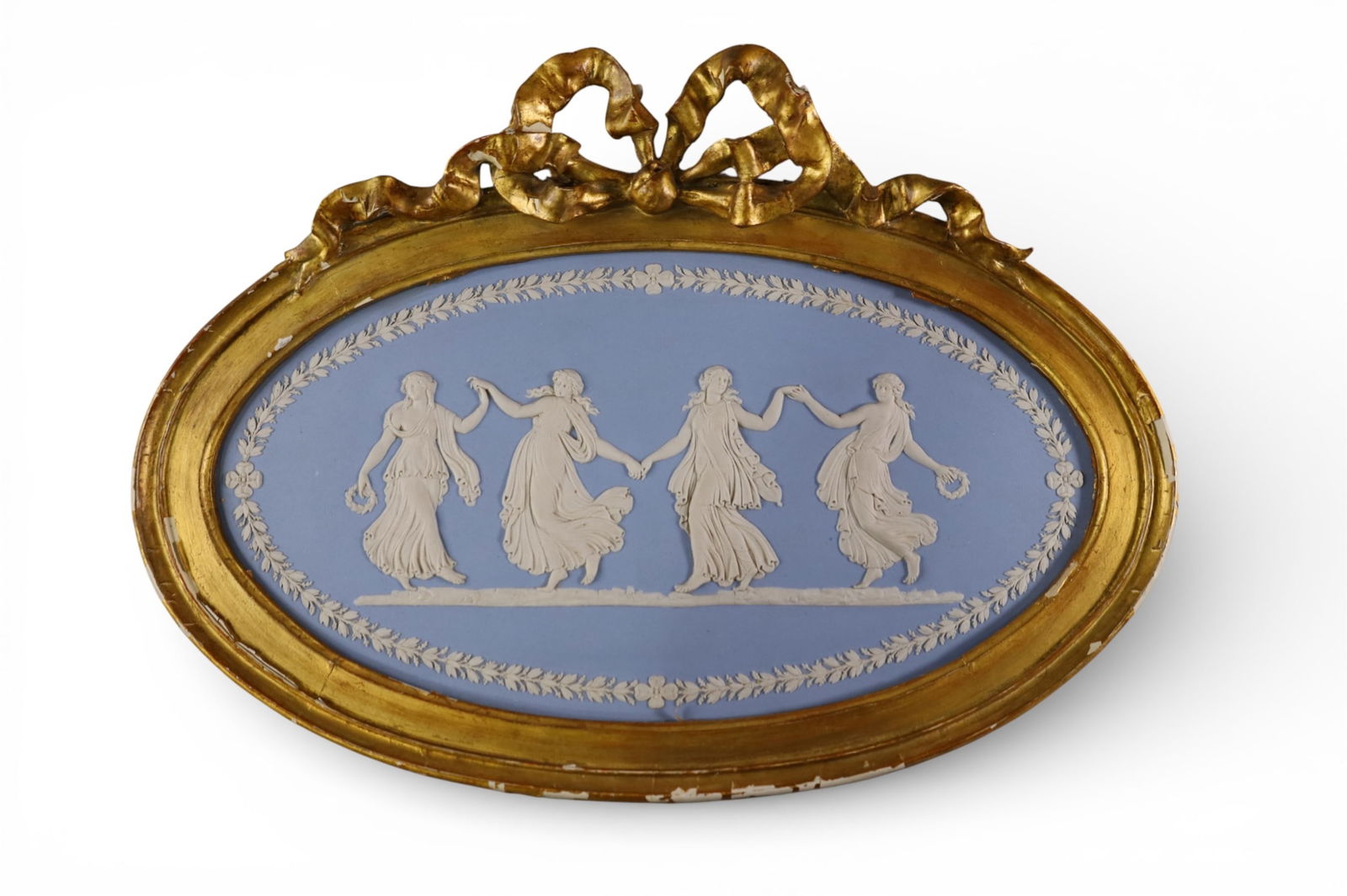 WEDGWOOD PLAQUE: FRAMED WEDGWOOD PLAQUE, IN GILT FRAME, TITLED DANCING HOURS. SOME CHIPS TO FRAME. 19 1/2" W x 14" H.