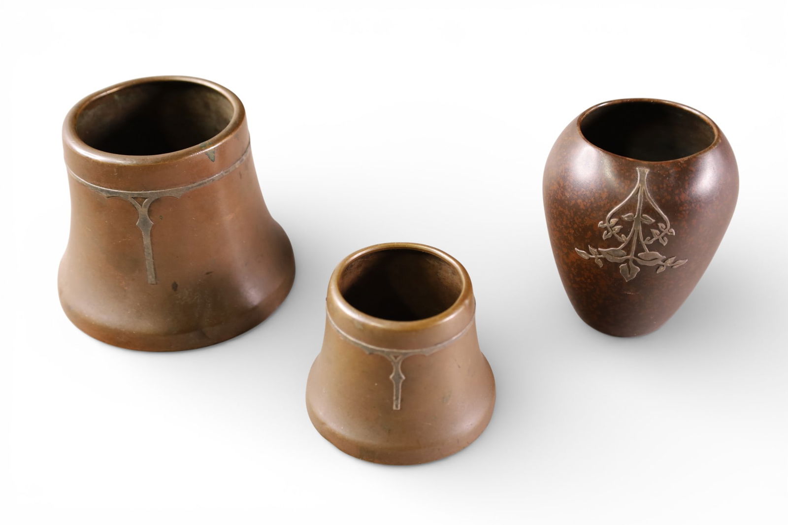 3 ARTS & CRAFTS BRONZE VASES: 3 ARTS & CRAFTS BRONZE VASES, HEINTZ STERLING OVER BRONZE (DENT) & 2 SILVERCREST VASES. 2 1/2" - 3 1/4" H.