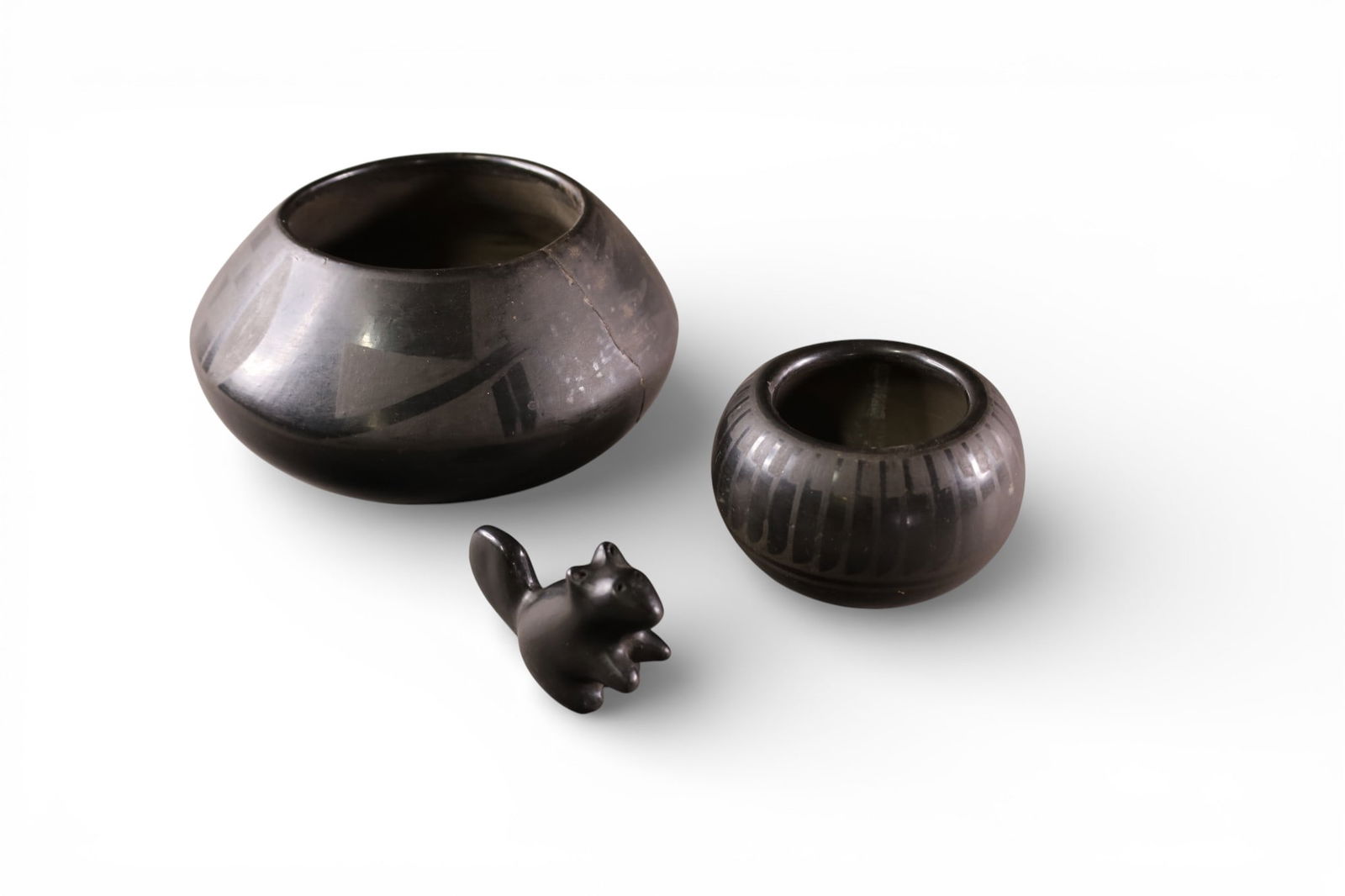 3 PIECES OF BLACKWARE POTTERY: LARGE BOWL HAS DAMAGE. 2 1/4" - 4" H.