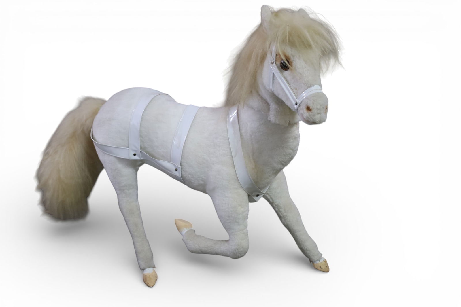 STORE DISPLAY HORSE: AUTOMATON STYLE STORE DISPLAY HORSE, HEAD MOVES WHEN ON. 42" L x 35" H. THIS ITEM EXCEEDS SIZE LIMITATIONS FOR IN HOUSE SHIPPING, MUST BE PICKED UP IN HOUSE OR SHIPPED VIA 3rd PARTY GROUND 