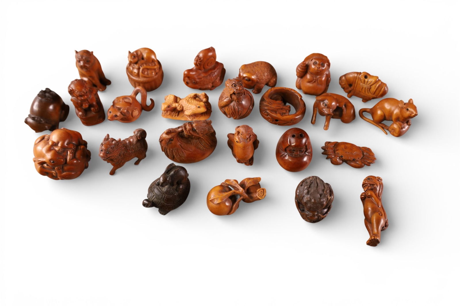 COLLECTION OF NETSUKI: WOODEN NETSUKIS. 1 1/2" L.