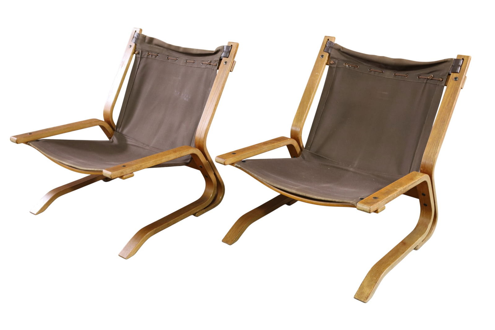 PAIR OF MCM RYKKEN SLING CHAIRS: BENT WOOD MCM SLING CHAIRS, RYKKEN SLING CHAIRS. 25" W x 29" D x 27" H. THIS ITEM EXCEEDS SIZE LIMITATIONS FOR IN HOUSE SHIPPING, MUST BE PICKED UP IN HOUSE OR SHIPPED VIA 3rd PARTY GROUND 