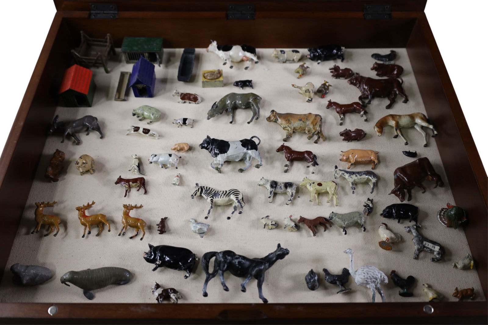 COLLECTION OF LEAD ANIMALS: COLLECTION OF APPROX 60 SMALL LEAD ANIMALS, PAINT LOSS. SHOWCASE NOT INCLUDED.