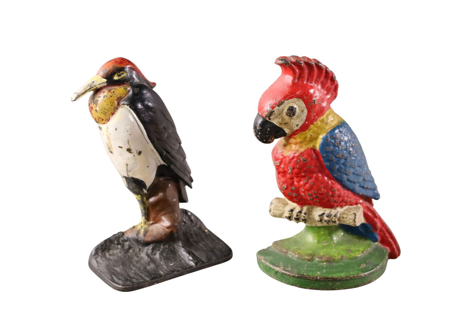 2 CAST IRON DOORSTOPS (1 of 2)