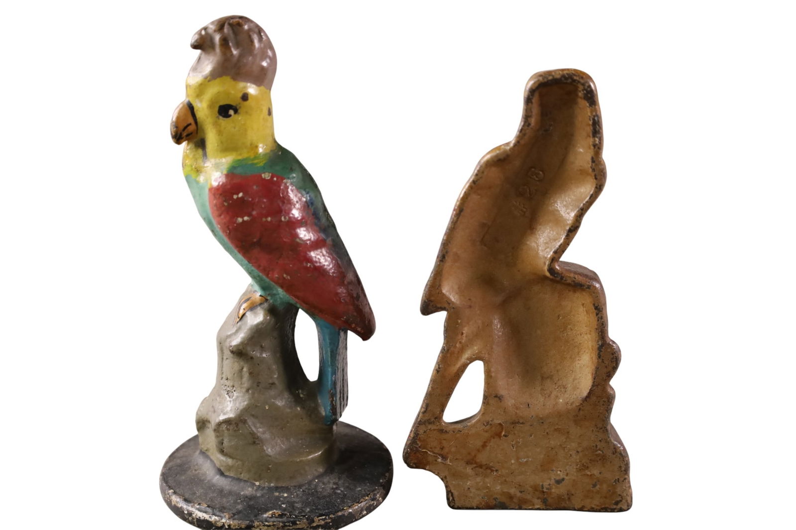 2 SMALL CAST IRON DOORSTOPS - 2