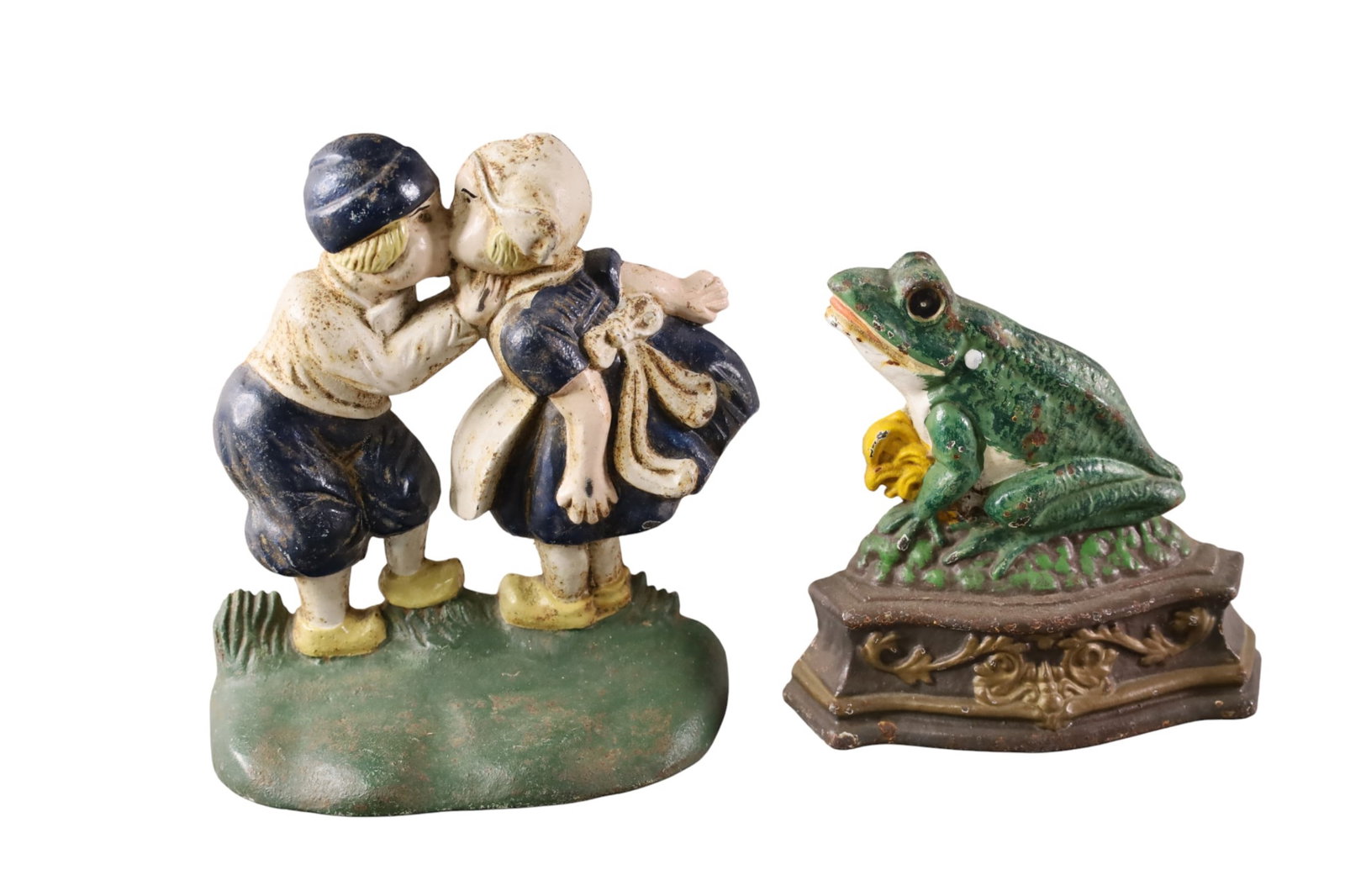 2 CAST IRON DOORSTOPS (1 of 3)