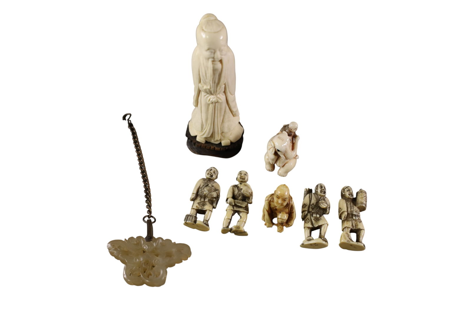GROUPING OF CHINESE ITEMS: BONE CARVED FIGURES, JADEITE PENDANT AND FIGURES.