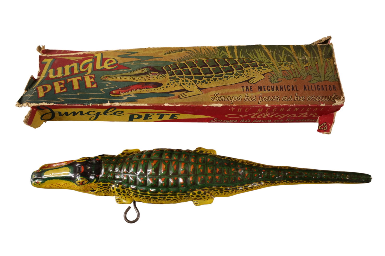 JUNGLE PETE WIND UP ALIGATOR: TIN LITHO WIND UP ALIGATOR TOY, IN ORIGINAL BOX. BY AUTOMATIC TOY CO. NON WORKING. 15" L.