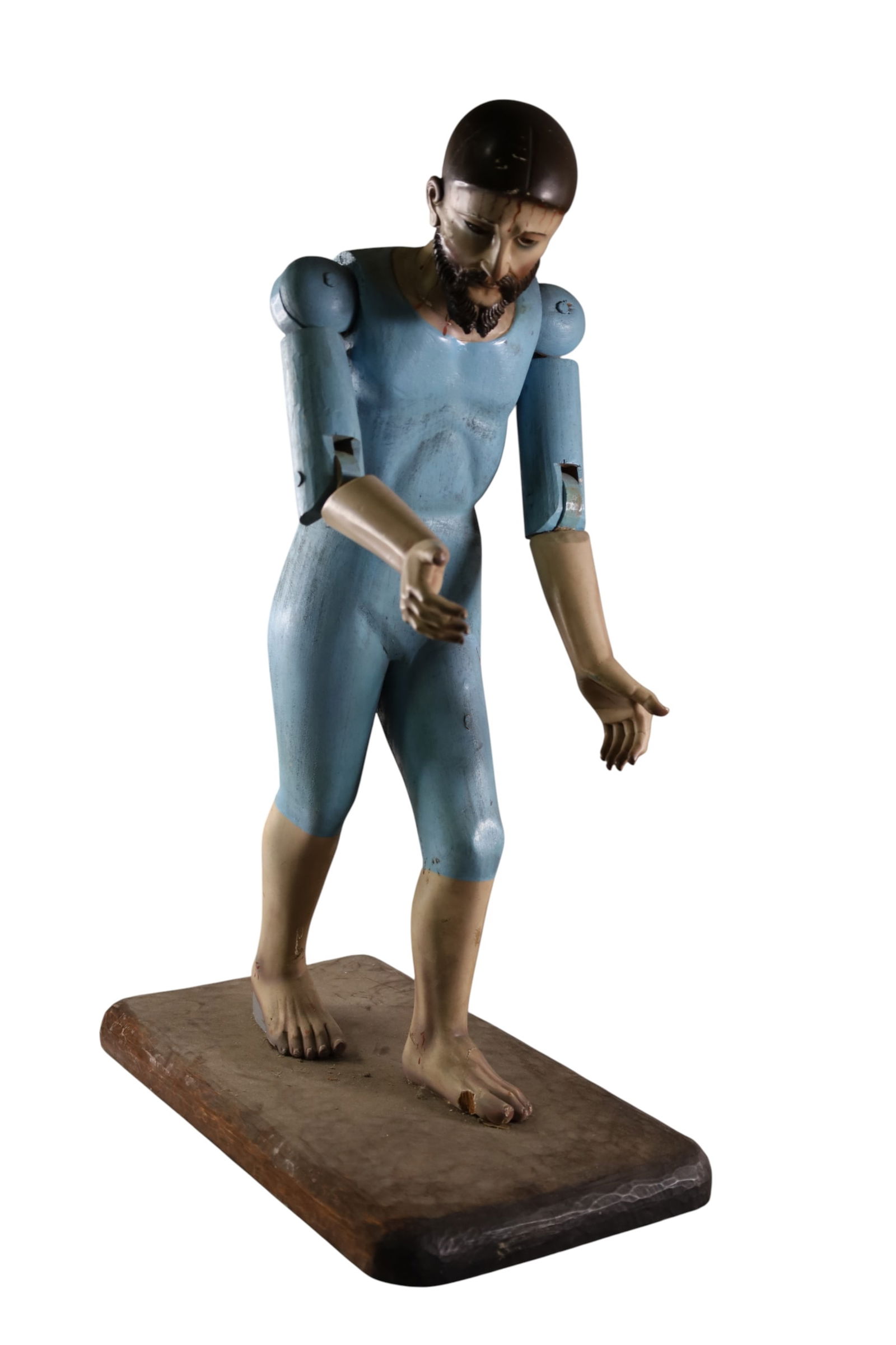 ARTICULATED SANTO FIGURE: LARGE WOODEN ARTICULATED JOINTED FIGURE. ON WOODEN BASE. 30" h. THIS ITEM EXCEEDS SIZE LIMITATIONS FOR IN HOUSE SHIPPING, MUST BE PICKED UP IN HOUSE OR SHIPPED VIA 3rd PARTY GROUND SHIPPER.