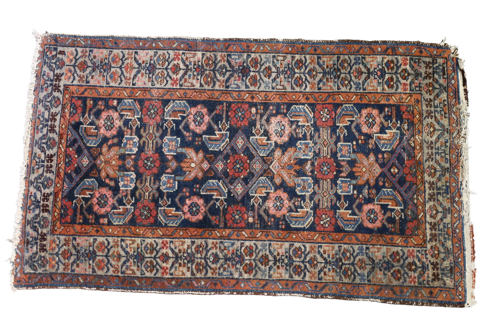 APPROX 3' 11" x 2' 3" HANDMADE WOOL RUG: ANTIQUE HANDMADE WOOL RUG, MINOR END LOSS.