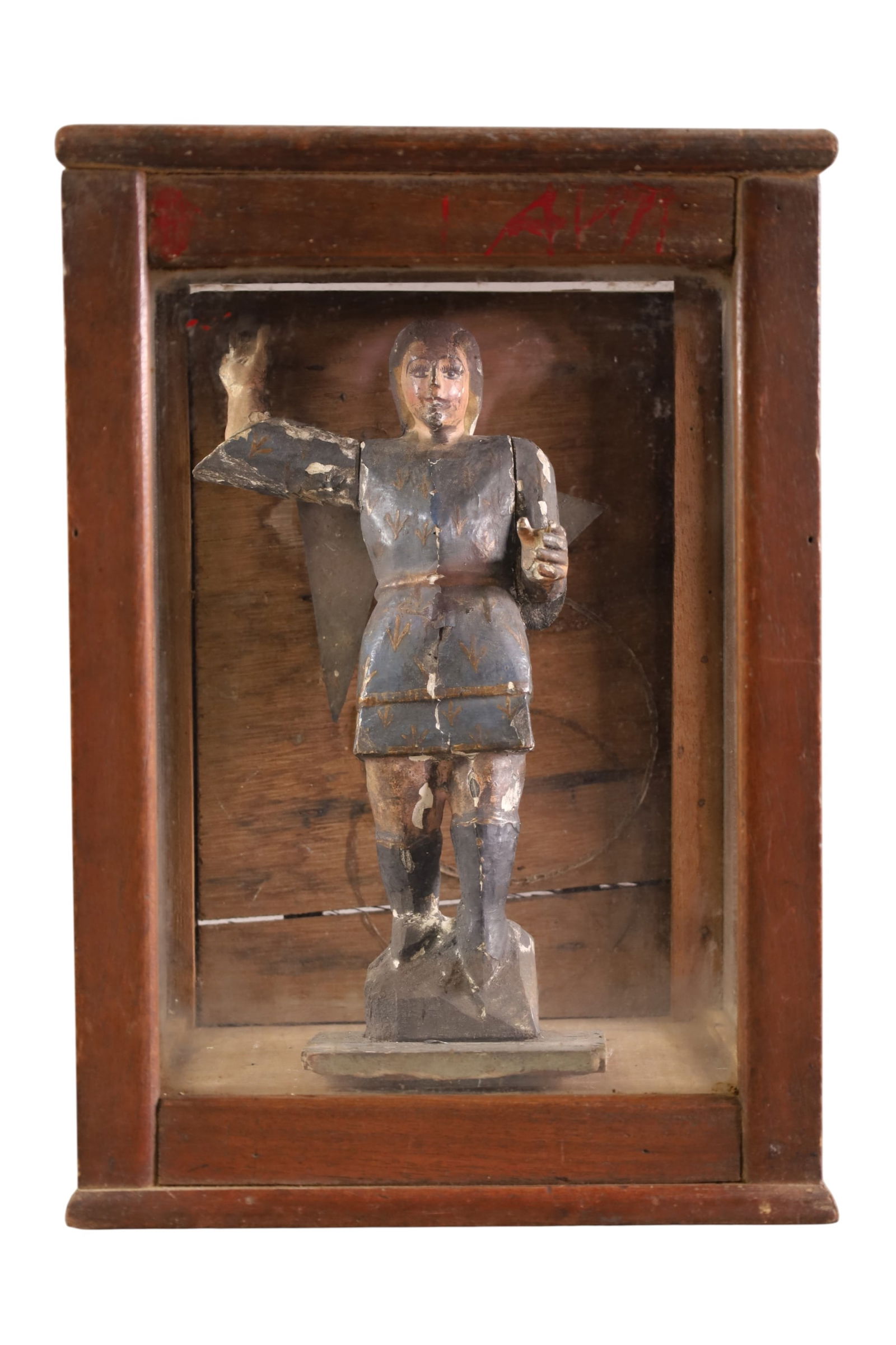 SMALL RELIGIOUS SANTO IN SHRINE: SMALL WOODEN CARVED POLYCHROME PAINTED SANTO IN SHRINE, POSSIBLY ST MICHAEL. 9 1/2" X 13 1/2"