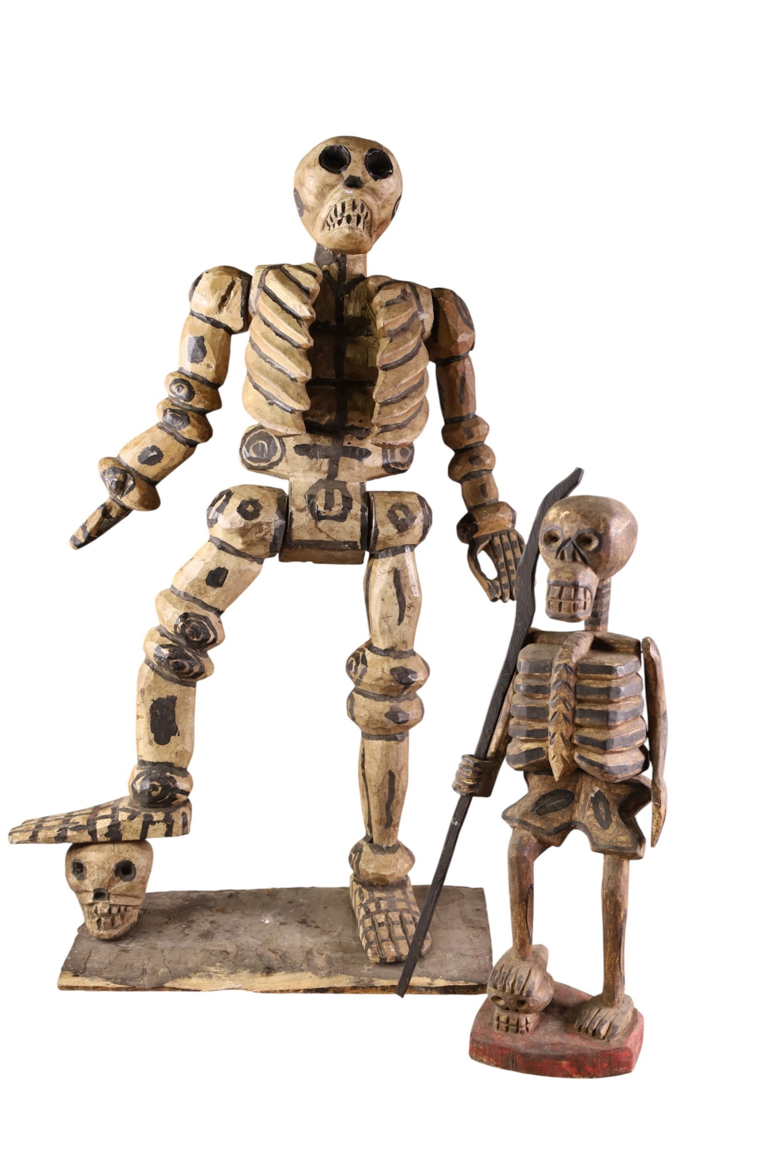 2 MEXICAN FOLK ART SKELETONS: 2 CARVED WOOD FOLK ART SKELETON FIGURES, 30" & 18" H. THIS ITEM EXCEEDS SIZE LIMITATIONS FOR IN HOUSE SHIPPING, MUST BE PICKED UP IN HOUSE OR SHIPPED VIA 3rd PARTY GROUND SHIPPER.