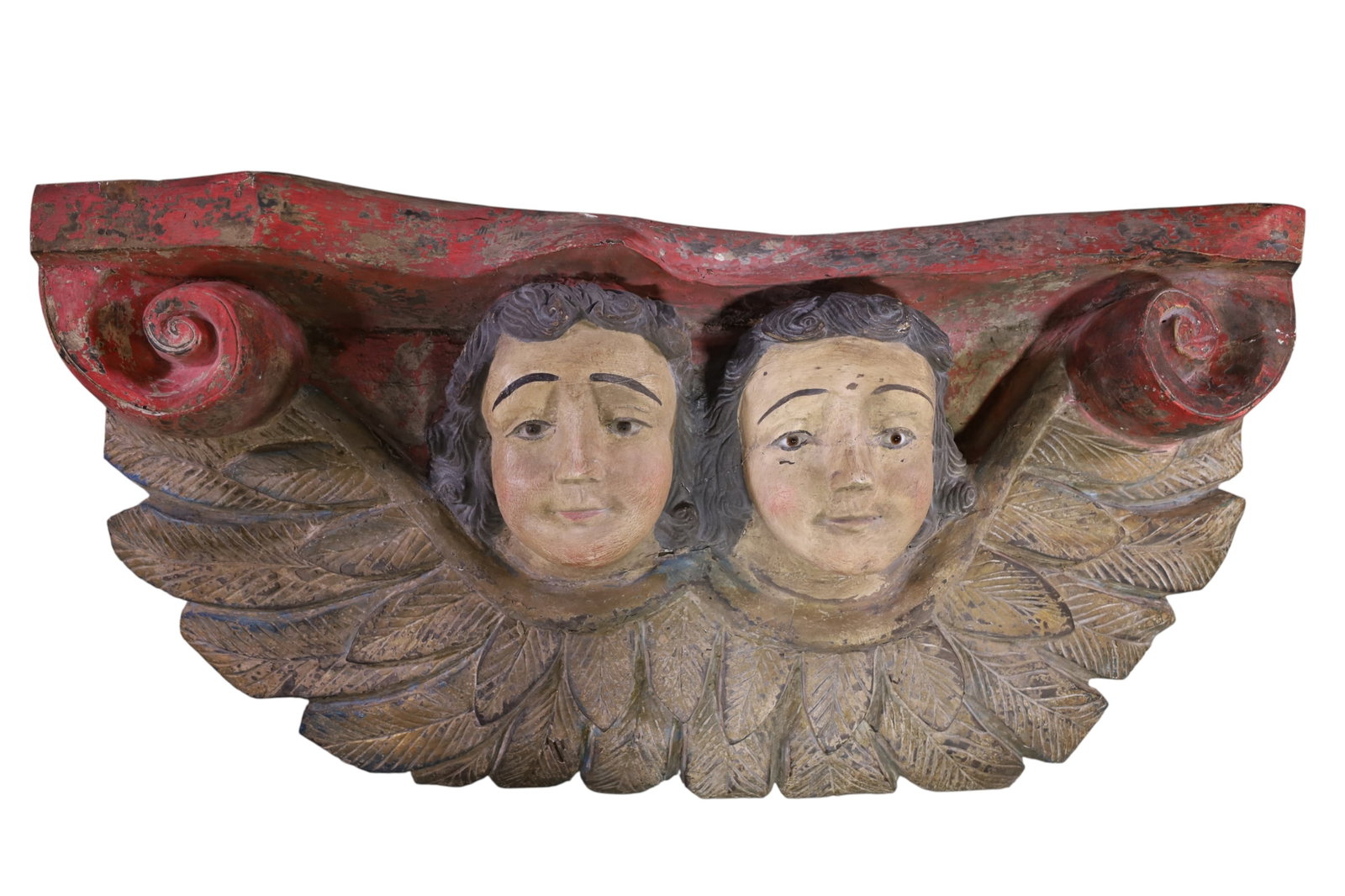 LARGE SPANISH COLONIAL ANGEL WALL SHELF: LARGE CARVED WOODEN, PAINTED ANGEL ARCHITECTUAL WALL SHELF, GLASS EYES. PAINT LOSS 42" W x 20" H. (13" DEEPEST POINT & 10" NARROW POINT). THIS ITEM EXCEEDS SIZE LIMITATIONS FOR IN HOUSE SHIPPING, 