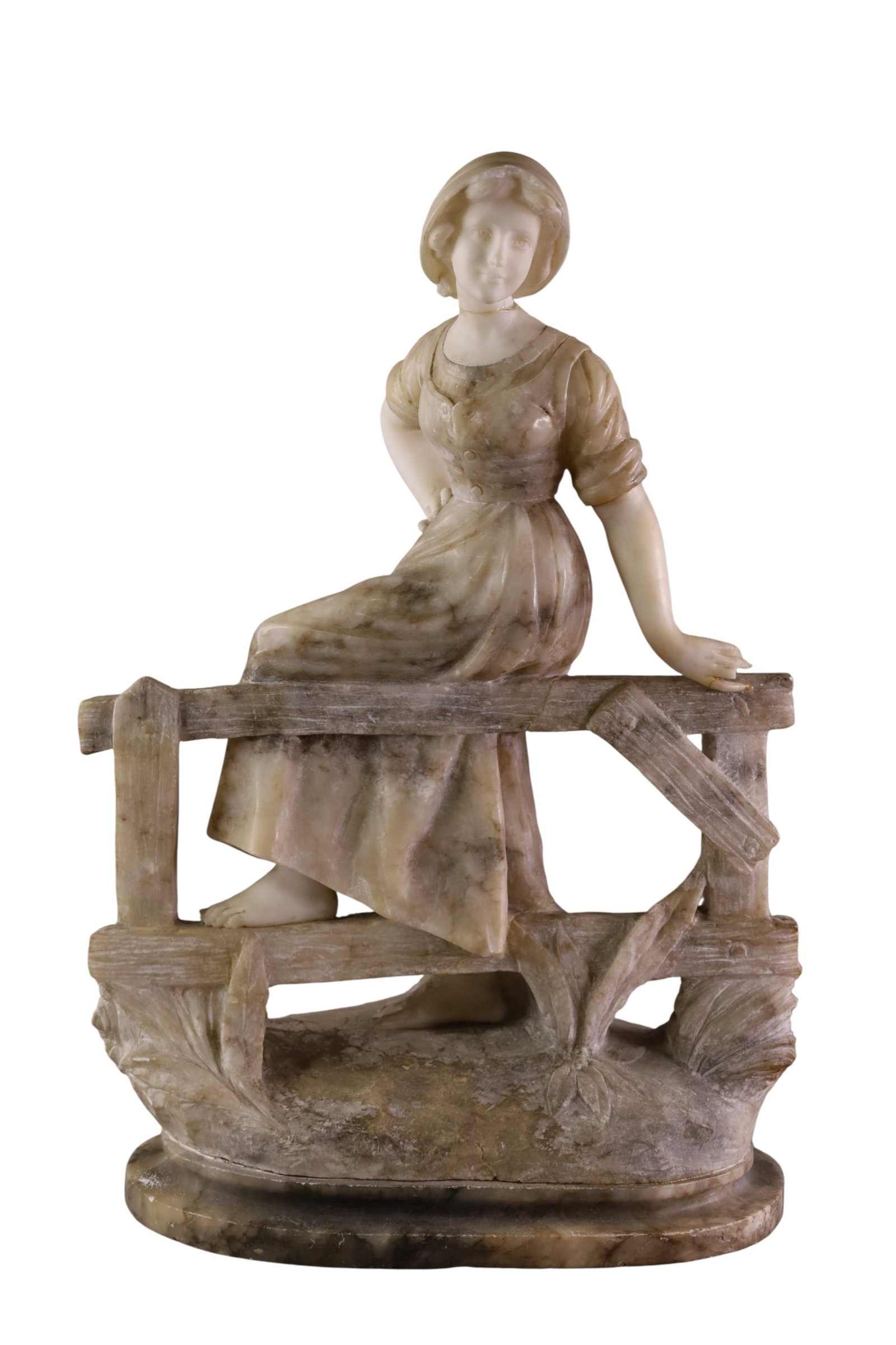 ALABASTER SCULPTURE: LARGE CARVED ALABASTER SCULPTURE, LADY SITTING ON FENCE. REPAIR TO HEAD. SIGNED 15" X 22" THIS ITEM EXCEEDS SIZE LIMITATIONS FOR IN HOUSE SHIPPING, MUST BE PICKED UP IN HOUSE OR SHIPPED VIA 3rd 