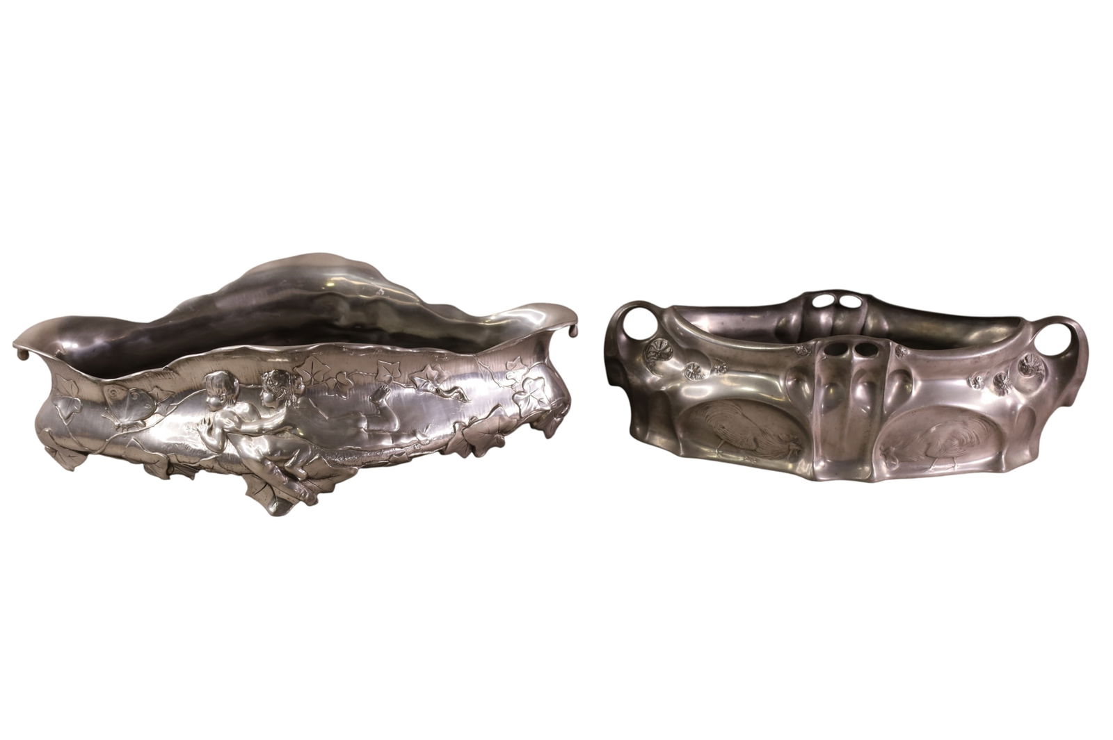 2 ART NOUVEAU PLANTERS: 2 ART NOUVEAU PEWTER PLANTERS. 15" - 17" W.