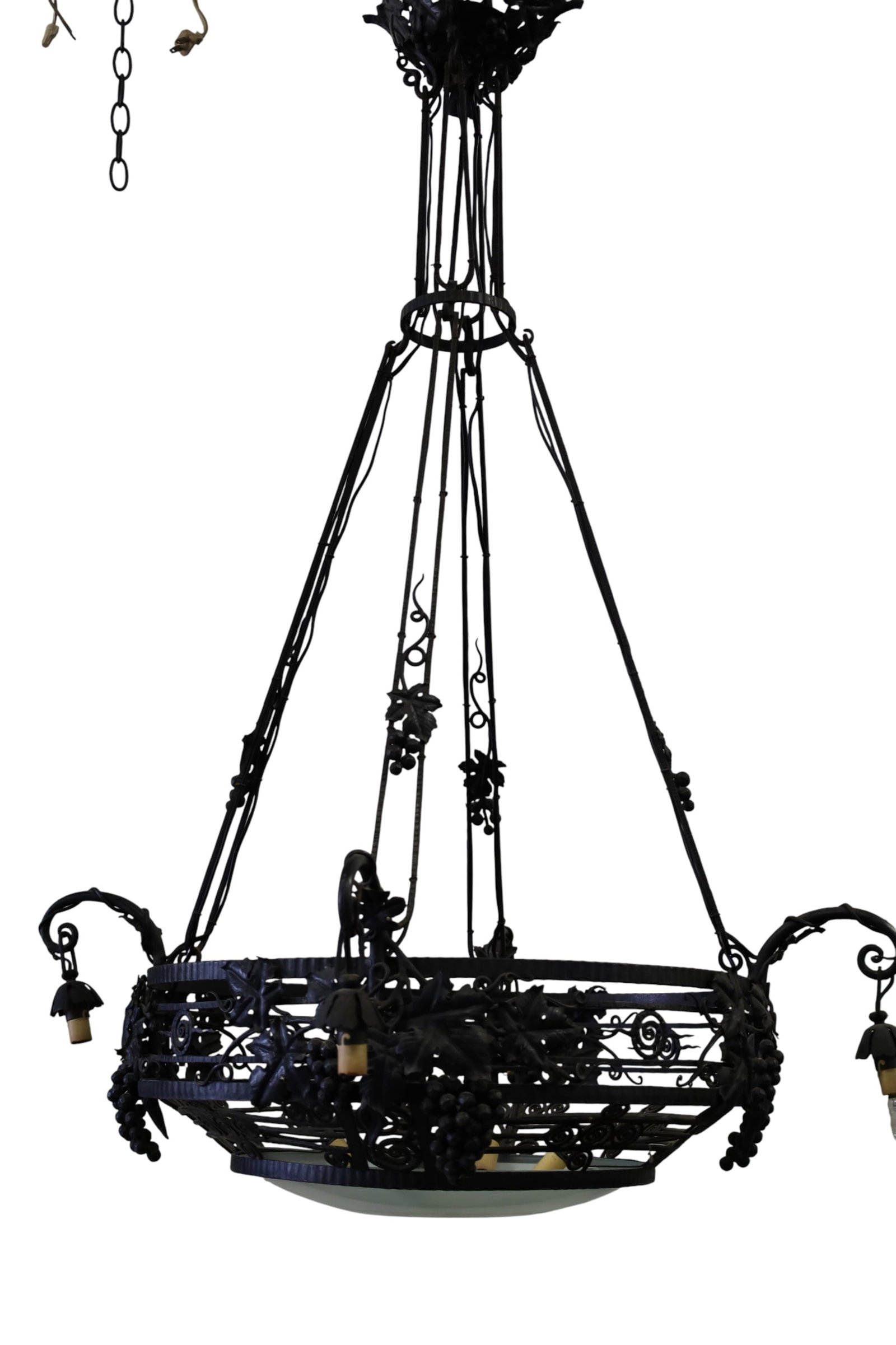 FRENCH IRON CHANDELIER: GRAPE MOTIF FRENCH IRON CHANDELIER, 4 MULLER FRES ART GLASS SHADES. MISSING RING THAT HOLDS SHADES ON. SHADES ARE LOOSE!!! REPLACED CENTER SHADE. 23" DIAM x 50" H. THIS ITEM EXCEEDS SIZE