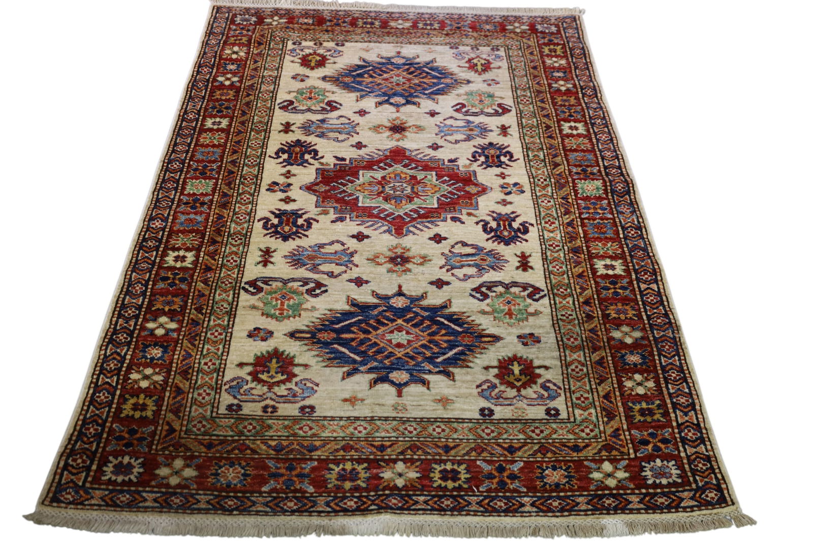 APPROX 5' 8" x 3' 11" HANDMADE WOOL RUG (1 of 4)
