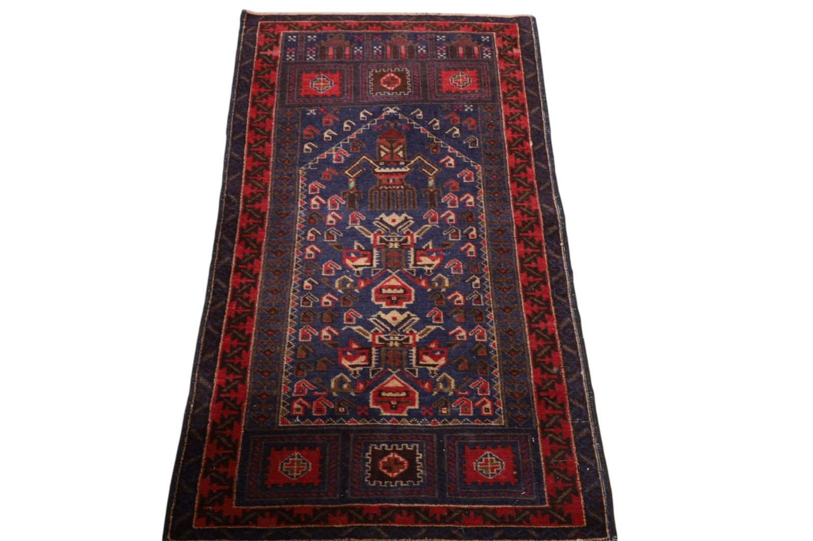 APPROX 4' 5" x 2' 8" HANDMADE WOOL RUG: HANDMADE WOOL RUG.