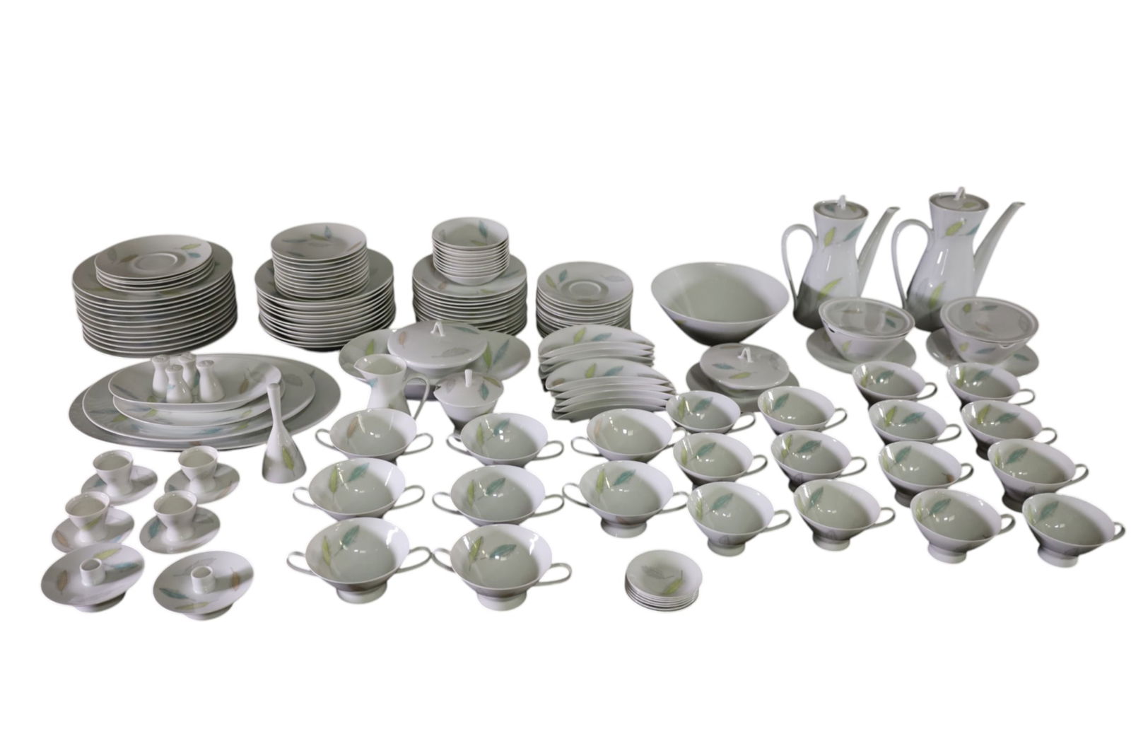 ROSENTHAL DISH SET: LARGE ROSENTHAL MID CENTURY MODERN STYLE DISH SET, ROSENTHAL BUNTE BLATTER, DESIGNED BY RAYMOND LOEWY, COLORED LEAVES OR MOVING LEAVES. PLACE SETTING FOR 12.