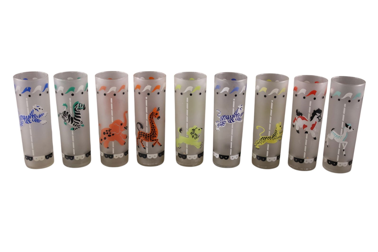 SET OF 9 MCM GLASSES: SET OF 9 MCM GLASSES, CAROUSEL ANIMAL DESIGNED. LIBBEY GLASS. 7" H.