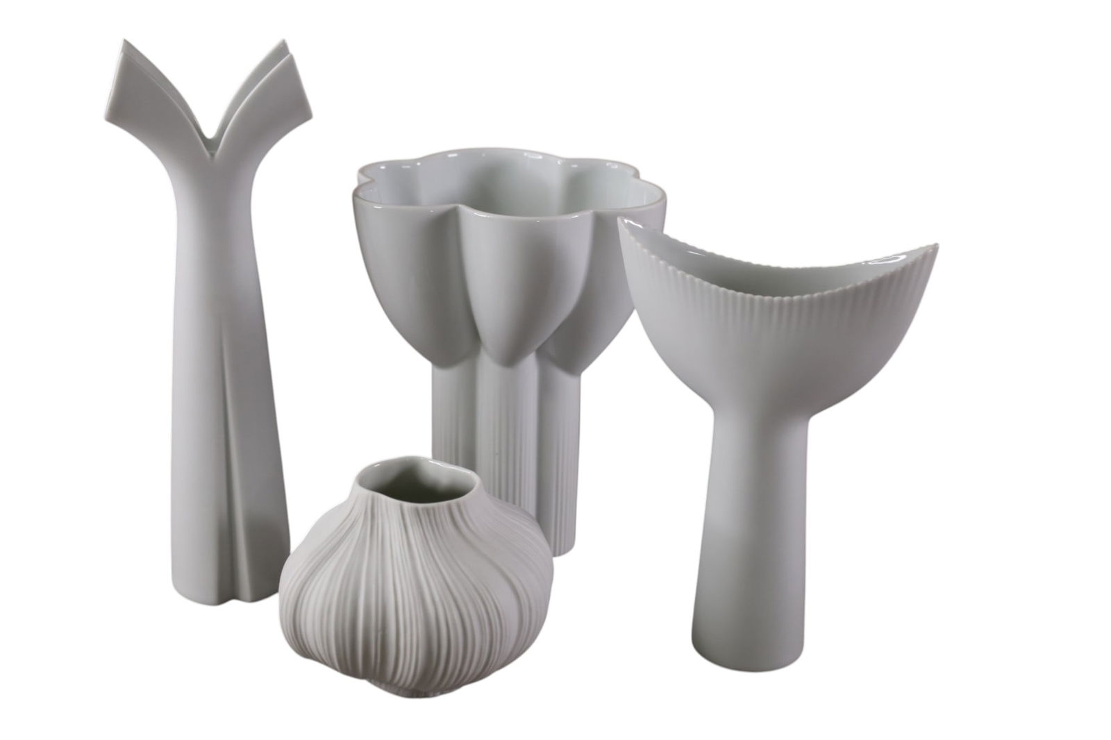 4 PCS OF ROSENTHAL PORCELAIN: ROSENTHAL STUDIO LINE VASES. 4 1/2" - 12" H.