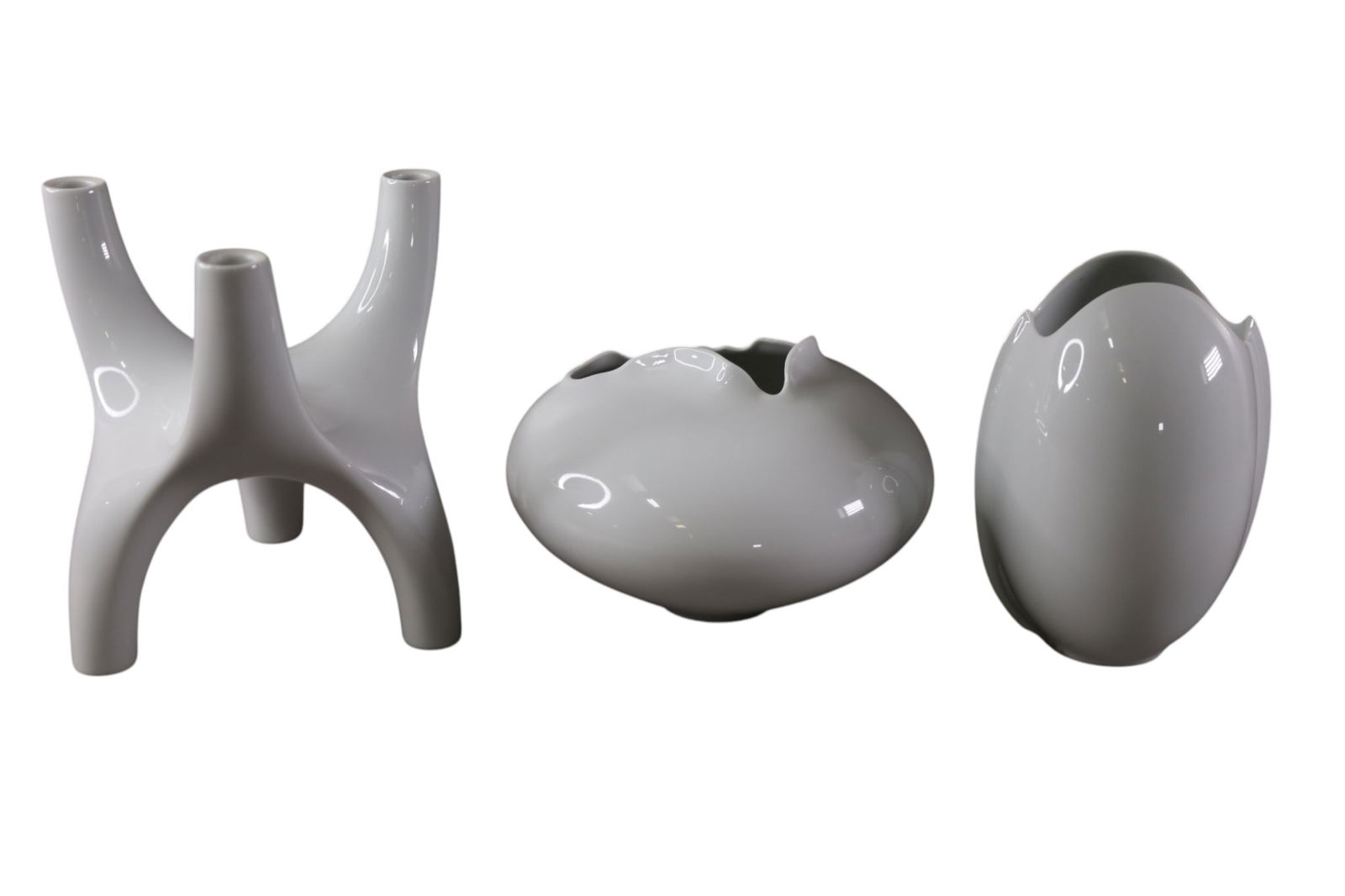 3 PCS OF ROSENTHAL STUDIO LINE PORCELAIN: TRIPLE CANDLESTICK AND TWO VASES. 6 1/2" - 10" H.