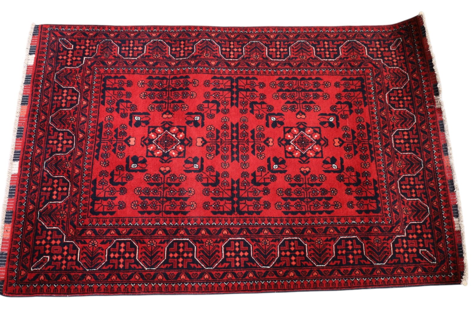 APPROX 5' 1" x 3' 3" HANDMADE WOO RUG: HANDMADE WOOL RUG