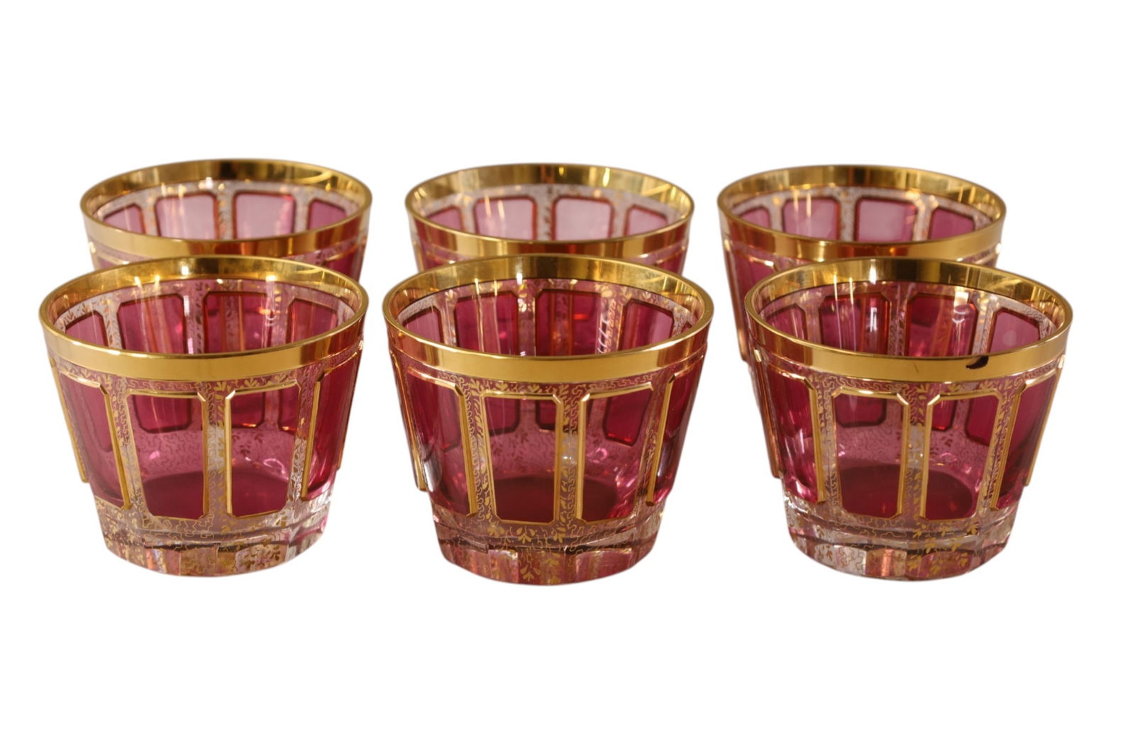 SET OF 6 UNSIGNED MOSER BOWLS: CRANBERRY AND GOLD ENAMEL MOSER BOWLS. ONE HAS CHIP. 3 1/2" H.
