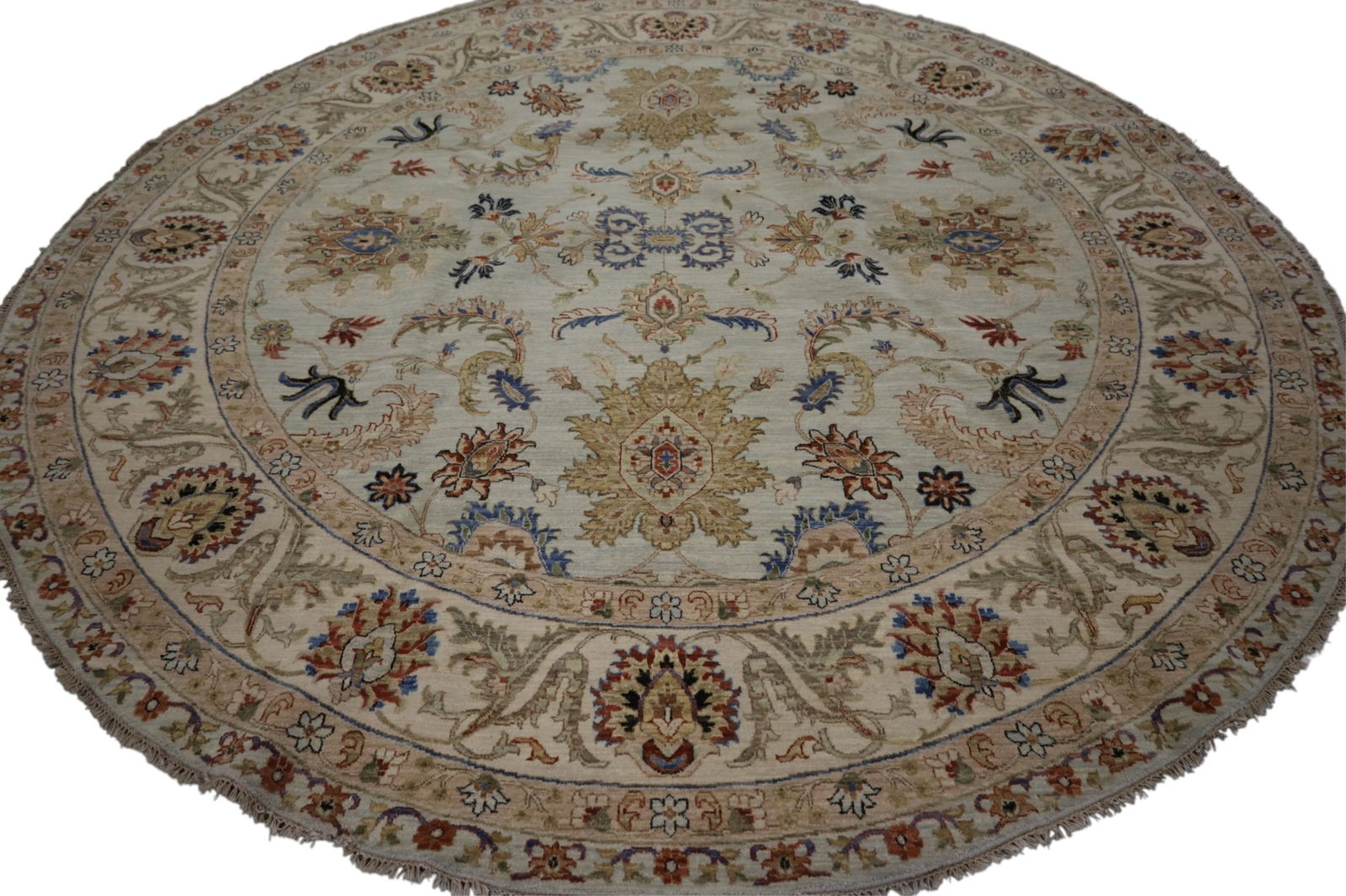APPROX 10' ROUND WOOL RUG: 10 FOOT DIAMETER ROUND WOOL RUG.