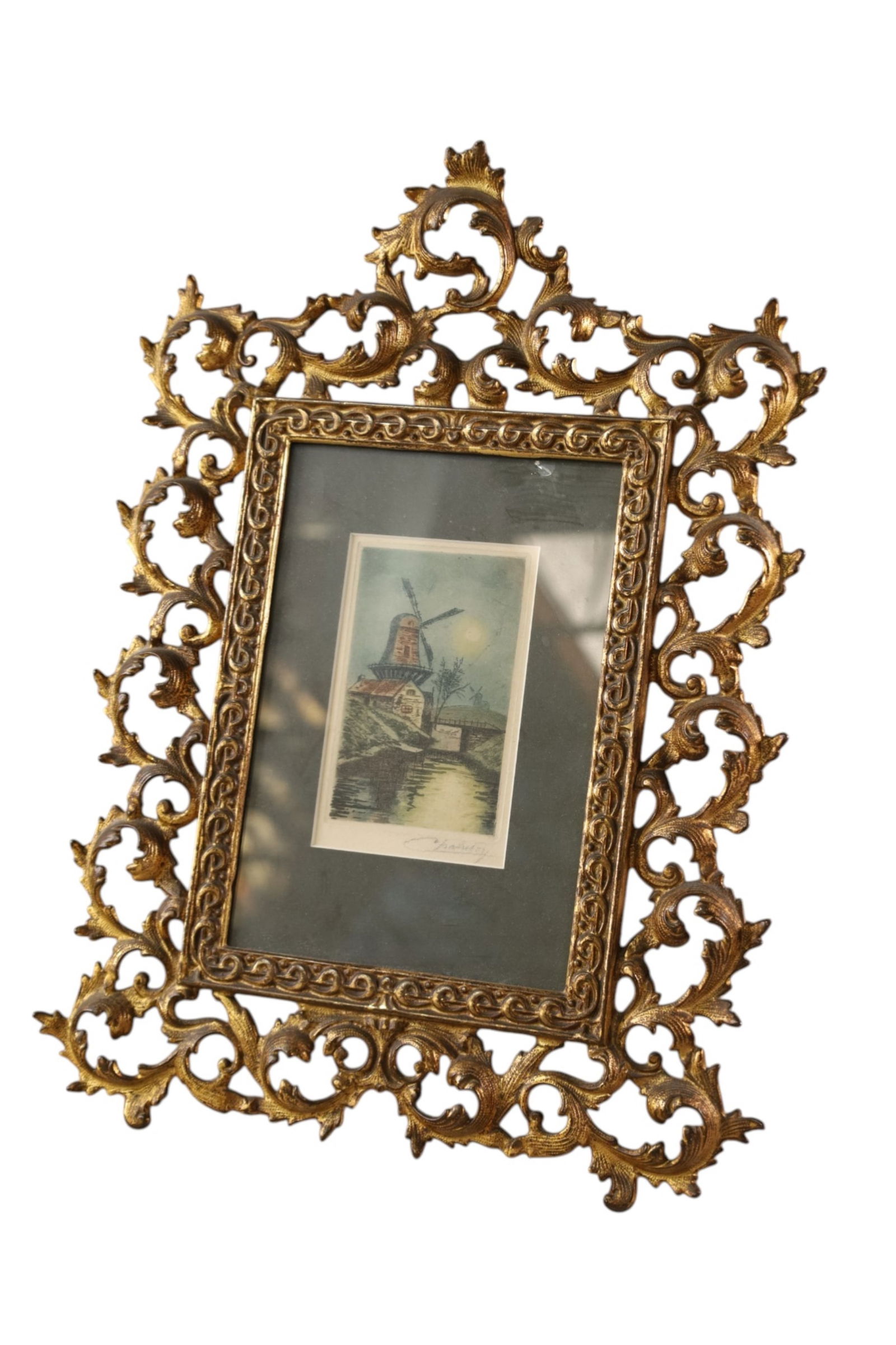 DUTCH PRINT IN GOLD GILT METAL FRAME: ARTIST SIGNED DUTCH PRINT IN EASEL BACK TABLE TOP FRAME. 12" x 16"