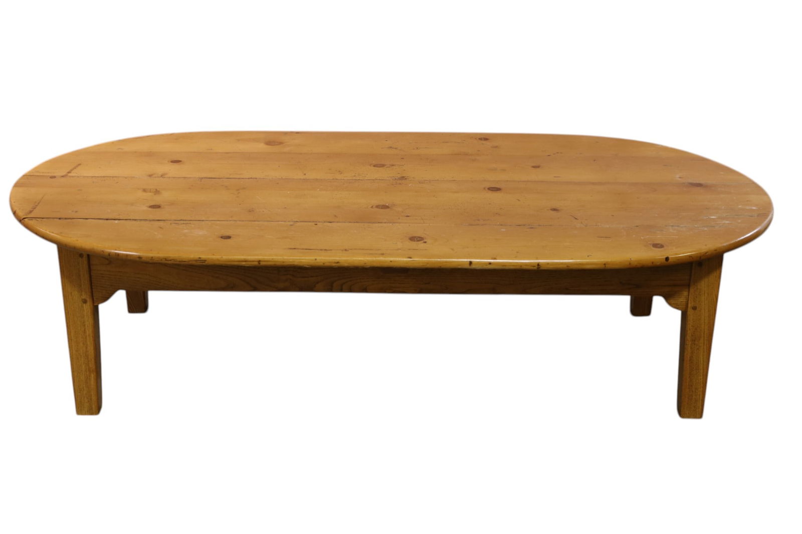 PRIMITIVE PINE COFFEE TABLE: LOW PINE COFFEE TABLE, 65" L x 33" D x 17" H. THIS ITEM EXCEEDS SIZE LIMITATIONS FOR IN HOUSE SHIPPING, MUST BE PICKED UP IN HOUSE OR SHIPPED VIA 3rd PARTY GROUND SHIPPER.