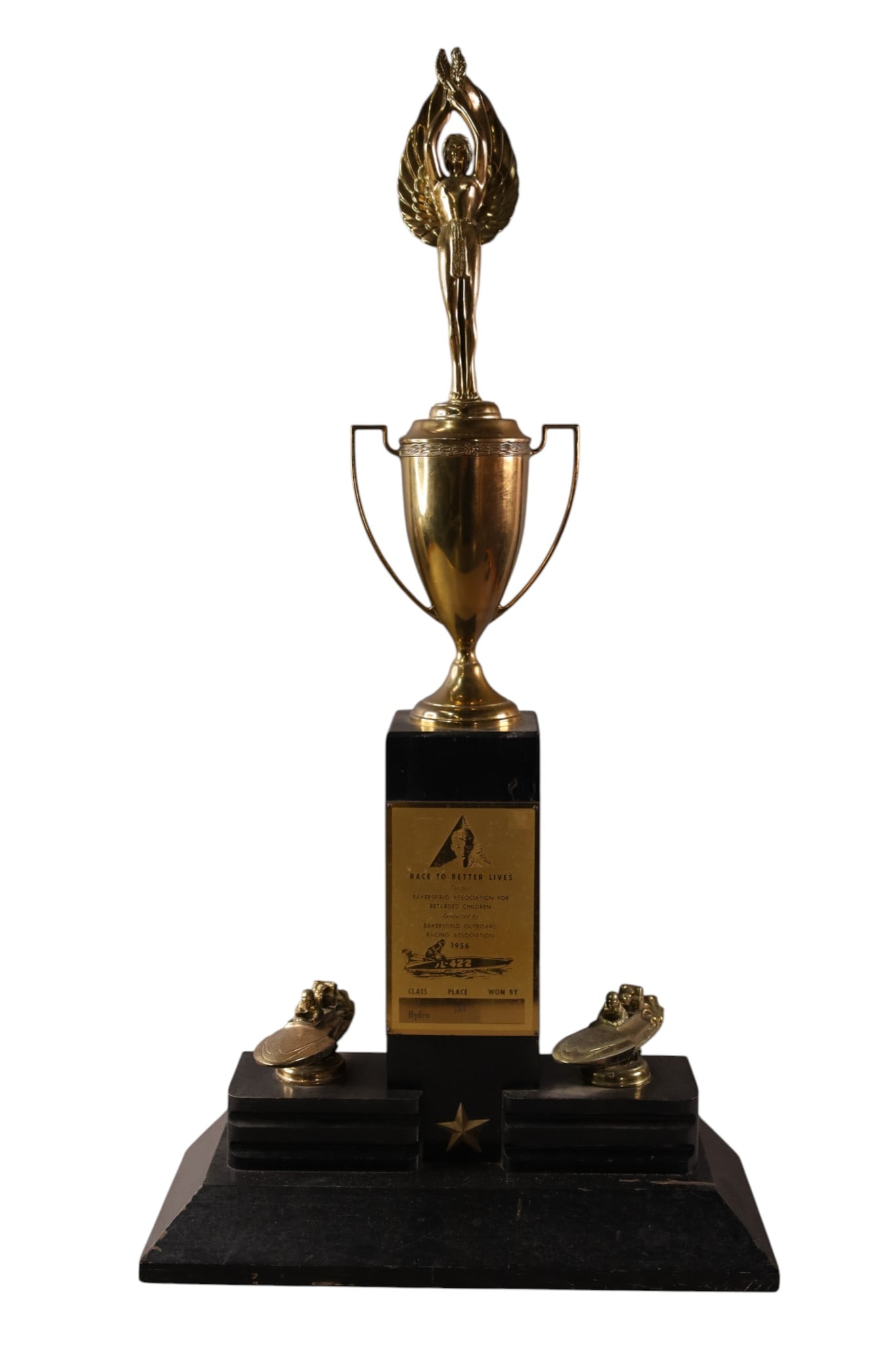 VINTAGE BOAT RACING TROPHY: 1956, BAKERSFIELD CALIFORNIA RACING BOAT TROPHY. 14" W x 28" H.