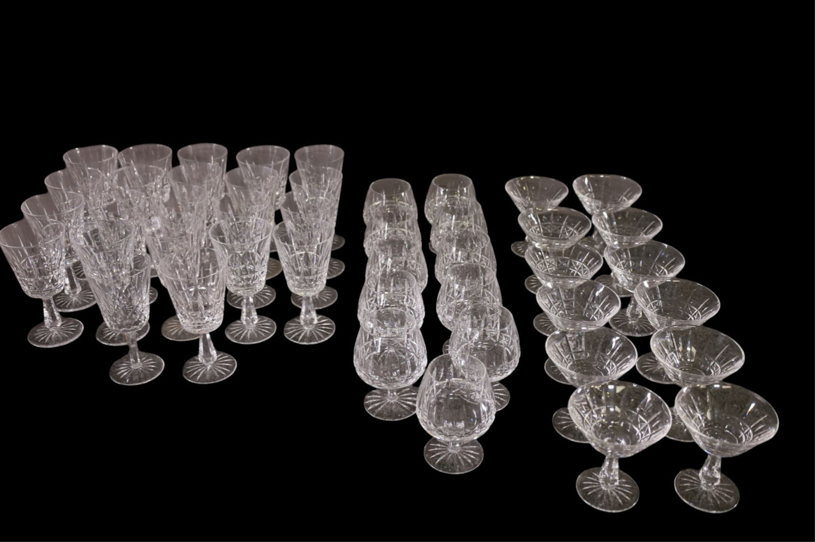 GROUPING OF WATERFORD KYLEMORE: 45 PCS OF WATERFLORD KYLEMORE STEMWARE, 22 WATER GOBLETS, 11 BRADY SNIFTERS, 12 TALL SHERBERTS.