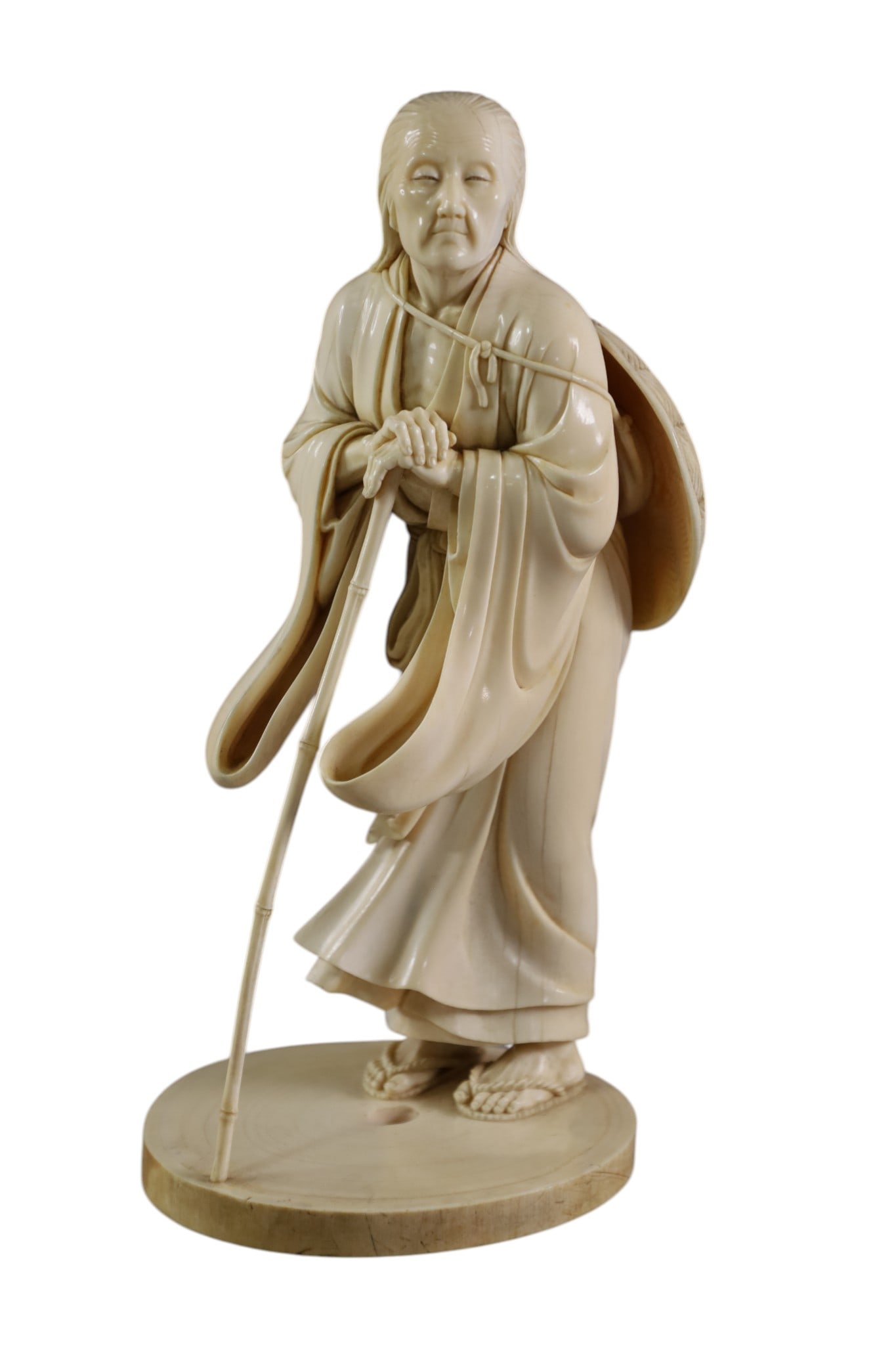 BONE CARVED FIGURE: LATE 19TH CENTURY CARVED BONE, OKIMONO, 8" H.