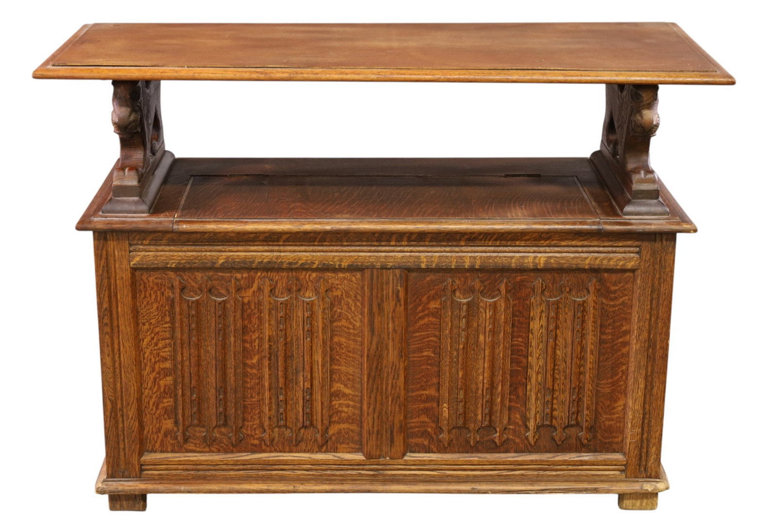1900'S OAK HALL BENCH: OAK FLIP TOP HALL BENCH, LION CARVED HANDLES. FLIP SEAT. 42" W x 17 1/2" D x 29 1/2" H. THIS ITEM EXCEEDS SIZE LIMITATIONS FOR IN HOUSE SHIPPING, MUST BE PICKED UP IN HOUSE OR SHIPPED VIA 3rd 