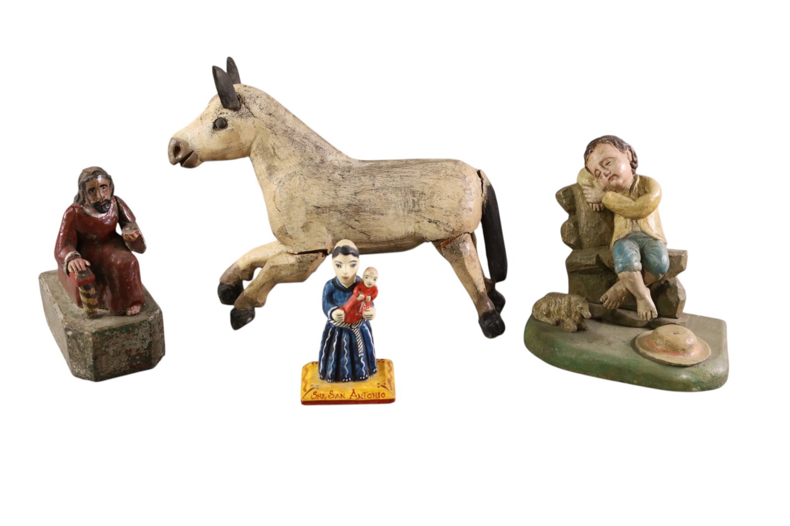 4 WOODEN FIGURES: 4 SMALL WOODEN CARVED FIGURES, SANTO STYLE FIGURES. 6" - 10 1/2" W.