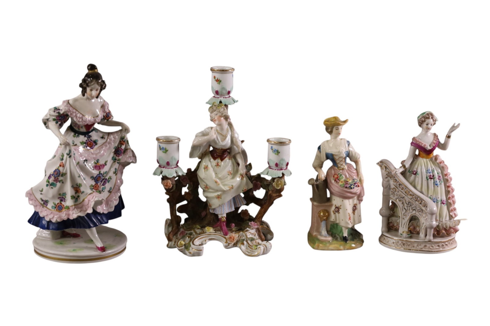 4 PORCELAIN FIGURES: ONE IS CANDLE HOLDER, NORITAKE, DRESDEN, AND MORE. 7" - 10" H.