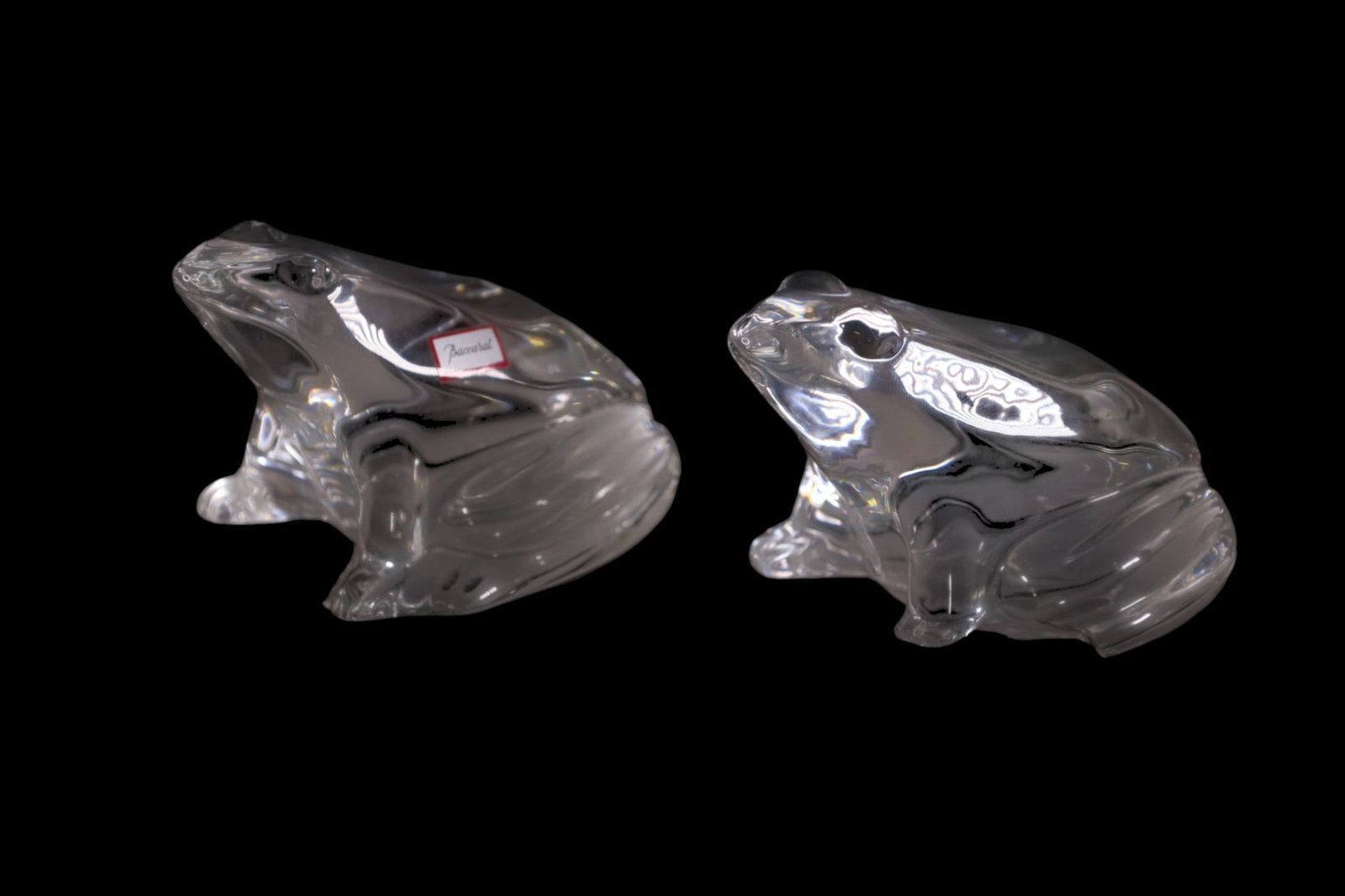 2 BACCARAT FROG PAPERWEIGHTS: 2 FROG FORM BACCARAT PAPER WEIGHTS, ONE WITH CHIP. 3" H.