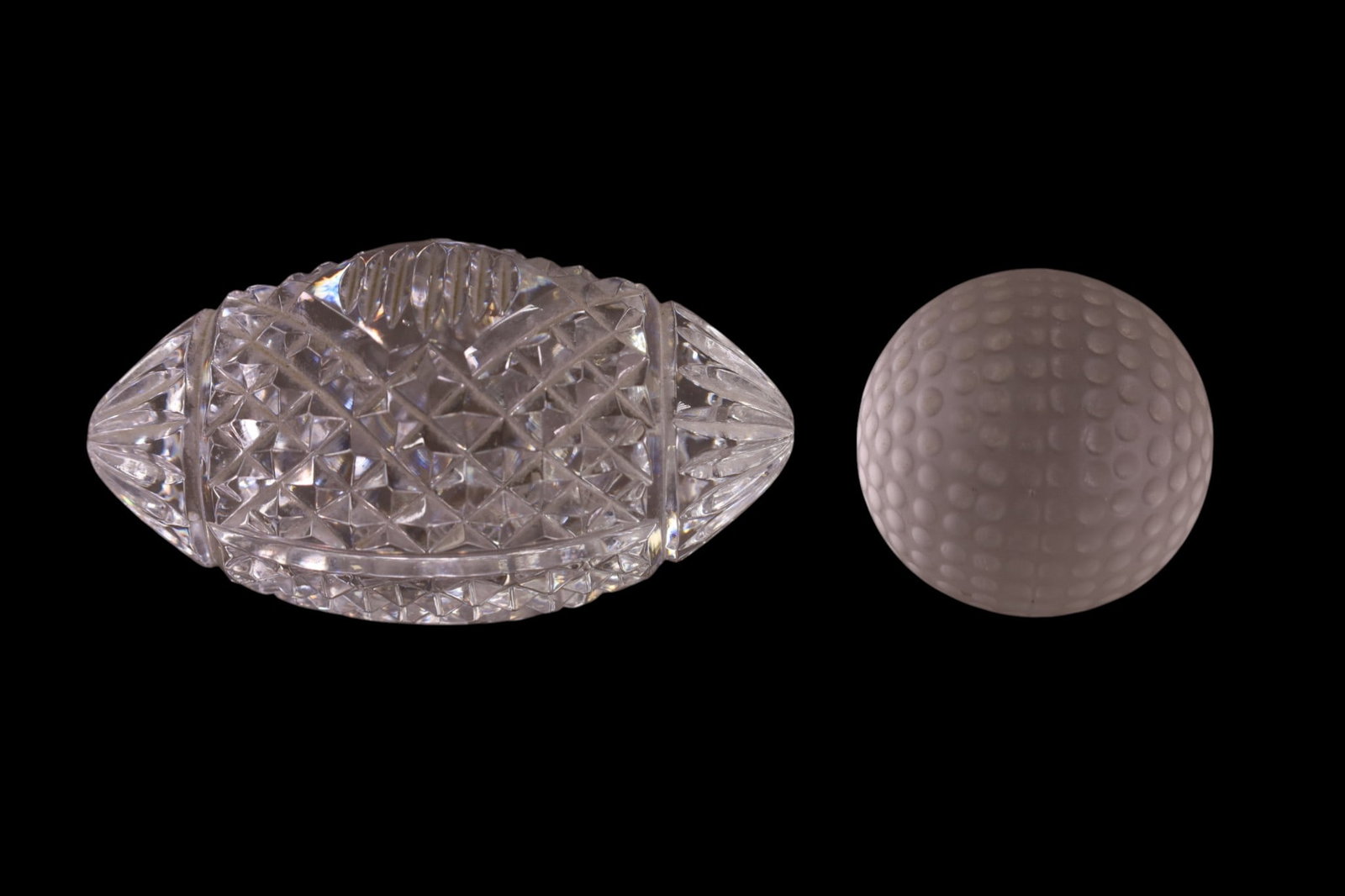 2 CRYSTAL BALL PAPERWEIGHTS: GOLF BALL & SAN FRANCISCO 49ERS SUPERBOWL FOOTBALL, VAL ST. LAMBERT & TIFFANY & CO. 4 1/2' - 2 1/4" W.