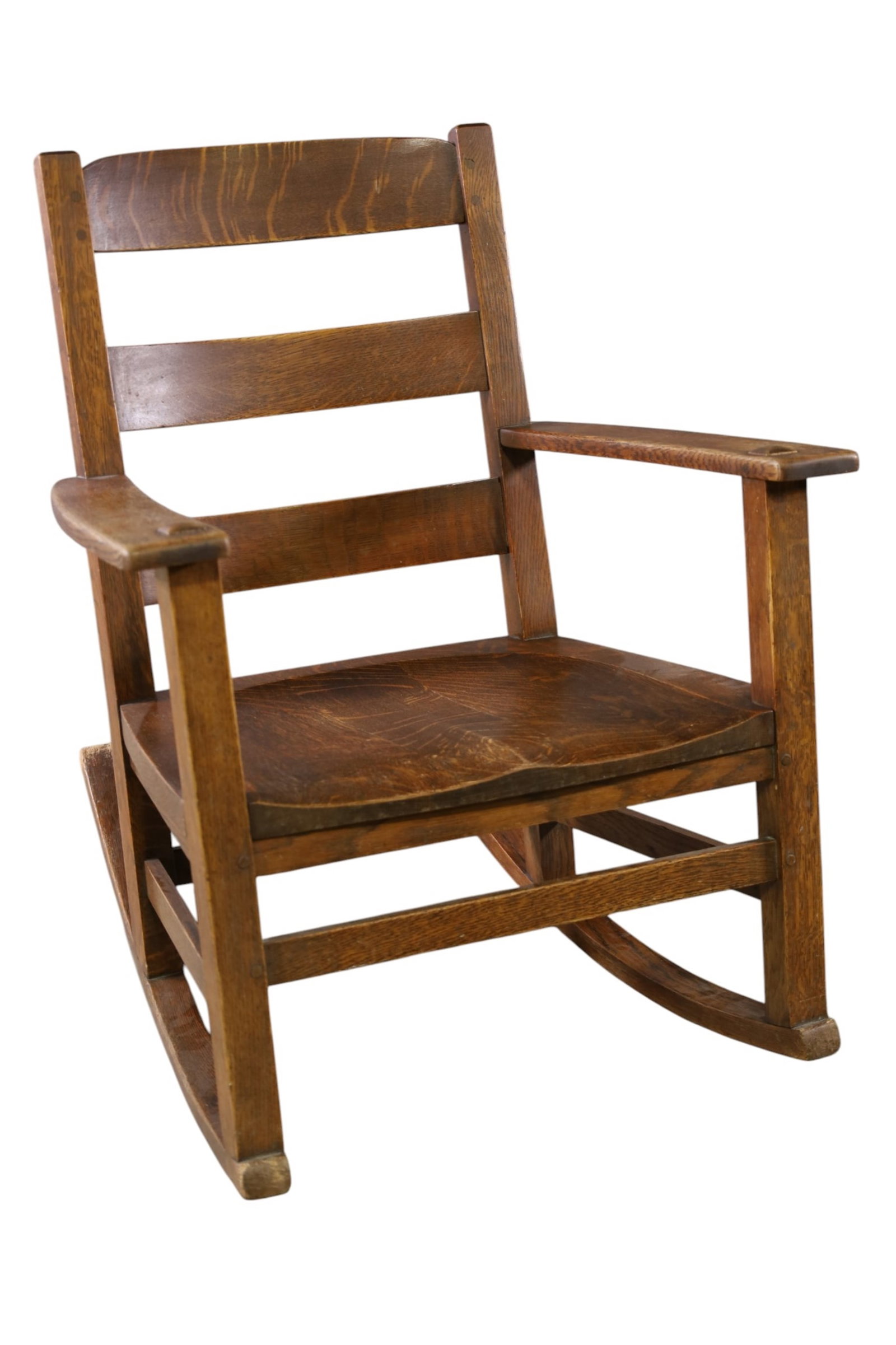 LIMBERT ROCKER: ARTS & CRAFTS OAK ROCKER, SIGNED LIMBERT UNDER ARM. MINOR WEAR TO FINISH. 26" W x 31" D x 34" H. THIS ITEM EXCEEDS SIZE LIMITATIONS FOR IN HOUSE SHIPPING, MUST BE PICKED UP IN HOUSE OR SHIPPED VIA
