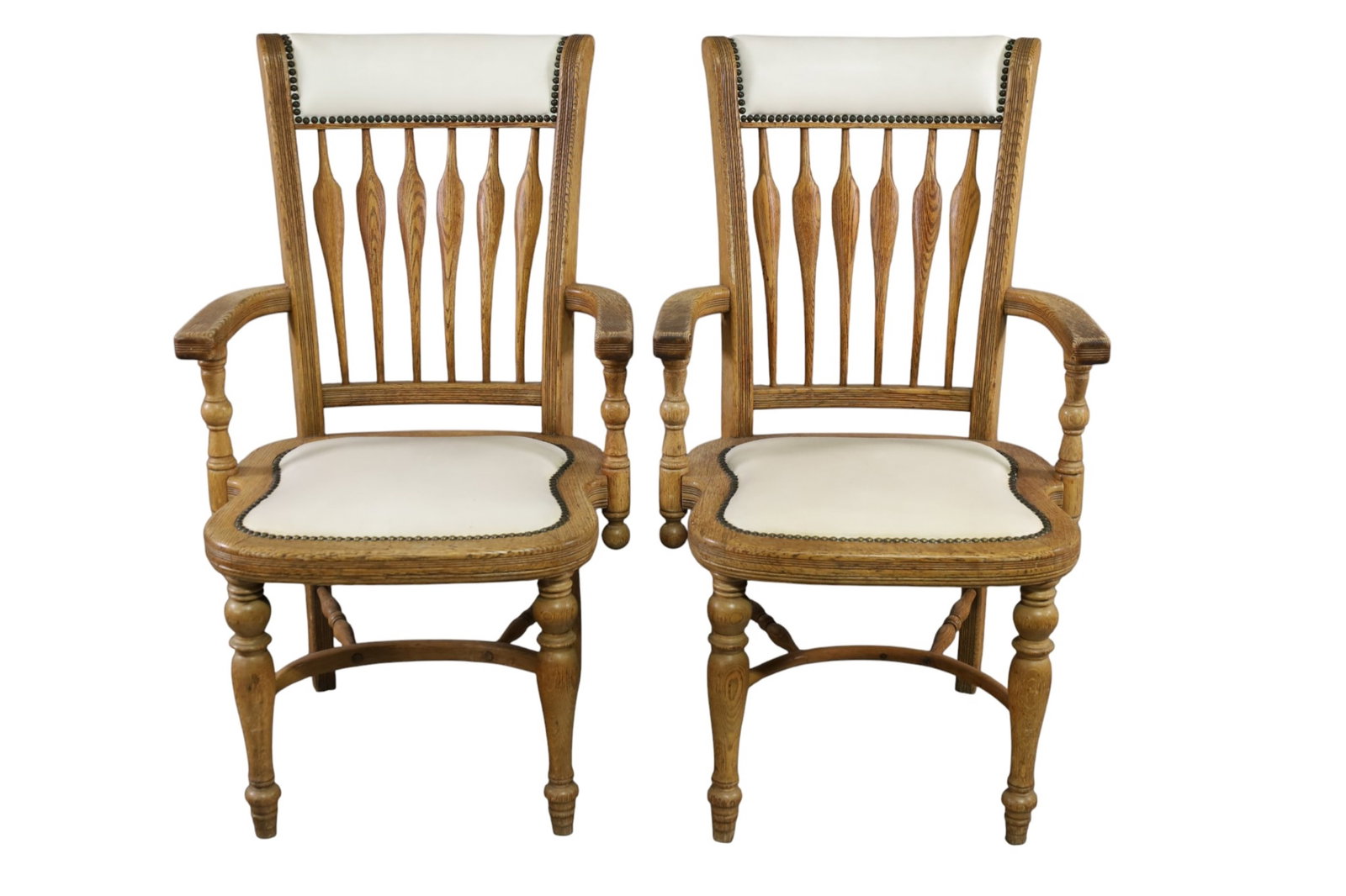 PAIR OF 19TH CENTURY OAK ARMCHAIRS: PAIR OF TALL BACK OAK ARMCHAIRS, BRASS TACKED. ARROW BACK. 24" W x 19" D x 40 1/2" H. THIS ITEM EXCEEDS SIZE LIMITATIONS FOR IN HOUSE SHIPPING, MUST BE PICKED UP IN HOUSE OR SHIPPED VIA 3rd PARTY
