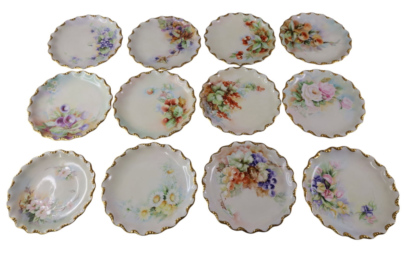 12 LIMOGES PLATES: HAND PAINTED PORCELAIN LIMOGES PLATES, FLORAL DECORATED. 7" DIAM.