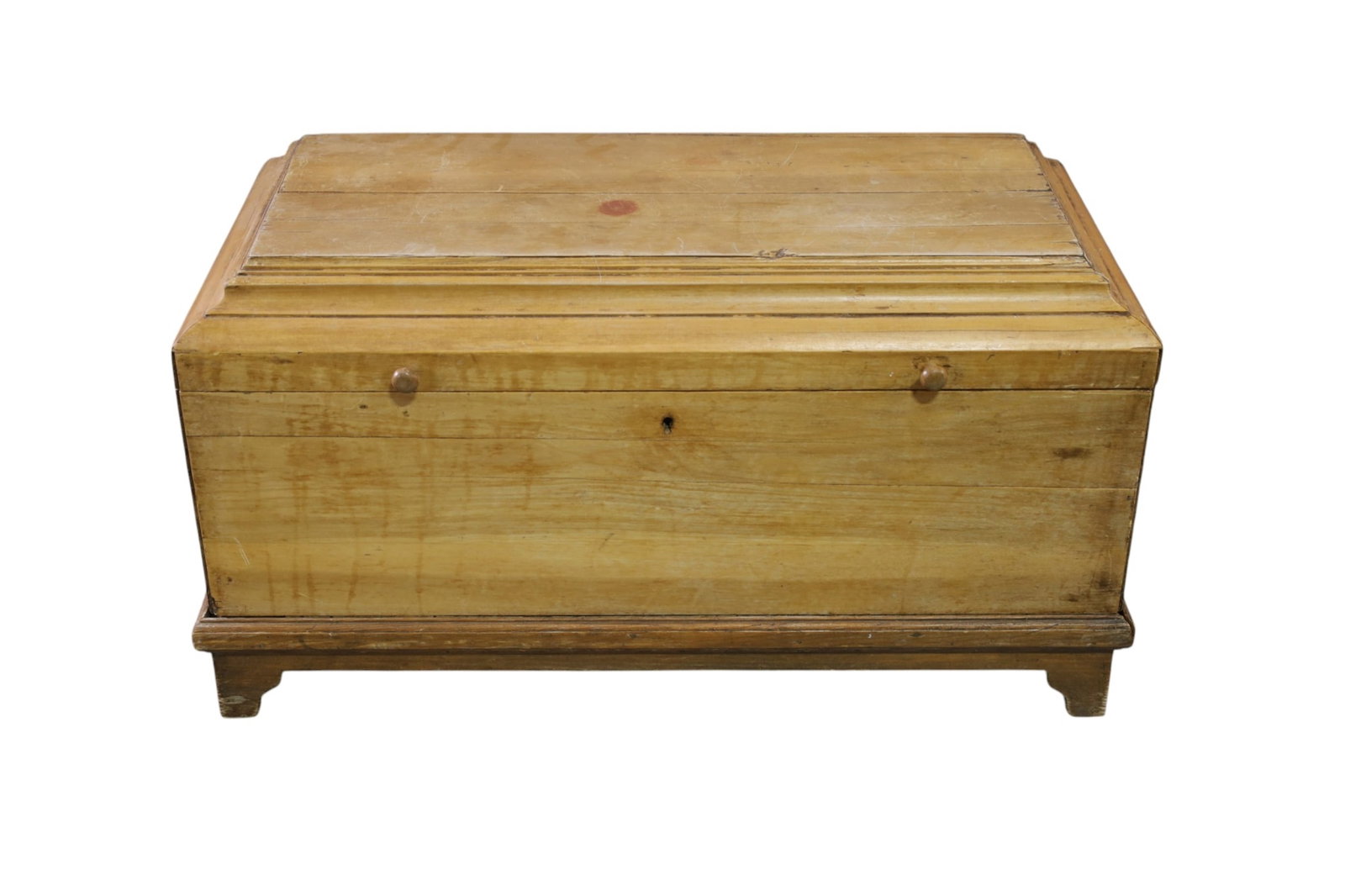 PINE TRUNK: SMALL PINE TRUNK ON STAND, AGE SPLITS. 34" W x 18" D x 18" H. THIS ITEM EXCEEDS SIZE LIMITATIONS FOR IN HOUSE SHIPPING, MUST BE PICKED UP IN HOUSE OR SHIPPED VIA 3rd PARTY GROUND SHIPPER.