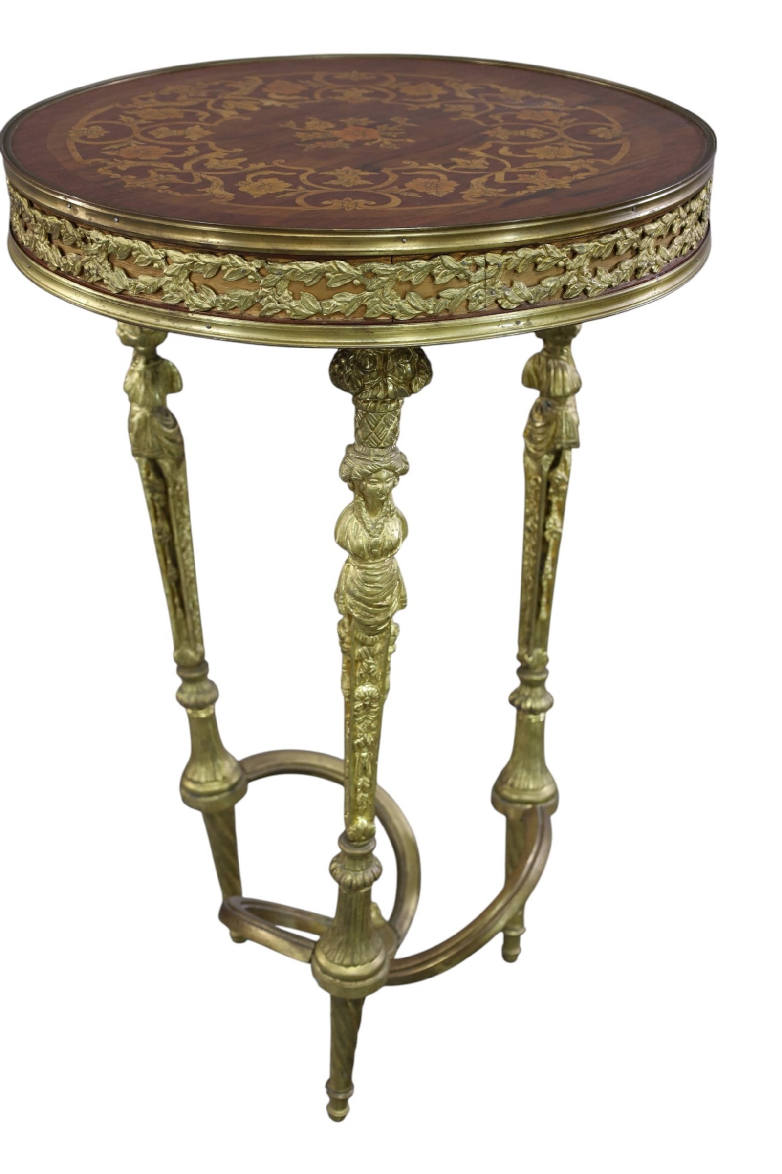 BRONZE BASE LAMP TABLE: FRENCH STYLE BRONZE FIGURAL LEGS, INLAID TOP, 20" DIAM x 32" H. THIS ITEM EXCEEDS SIZE LIMITATIONS FOR IN HOUSE SHIPPING, MUST BE PICKED UP IN HOUSE OR SHIPPED VIA 3rd PARTY GROUND SHIPPER.