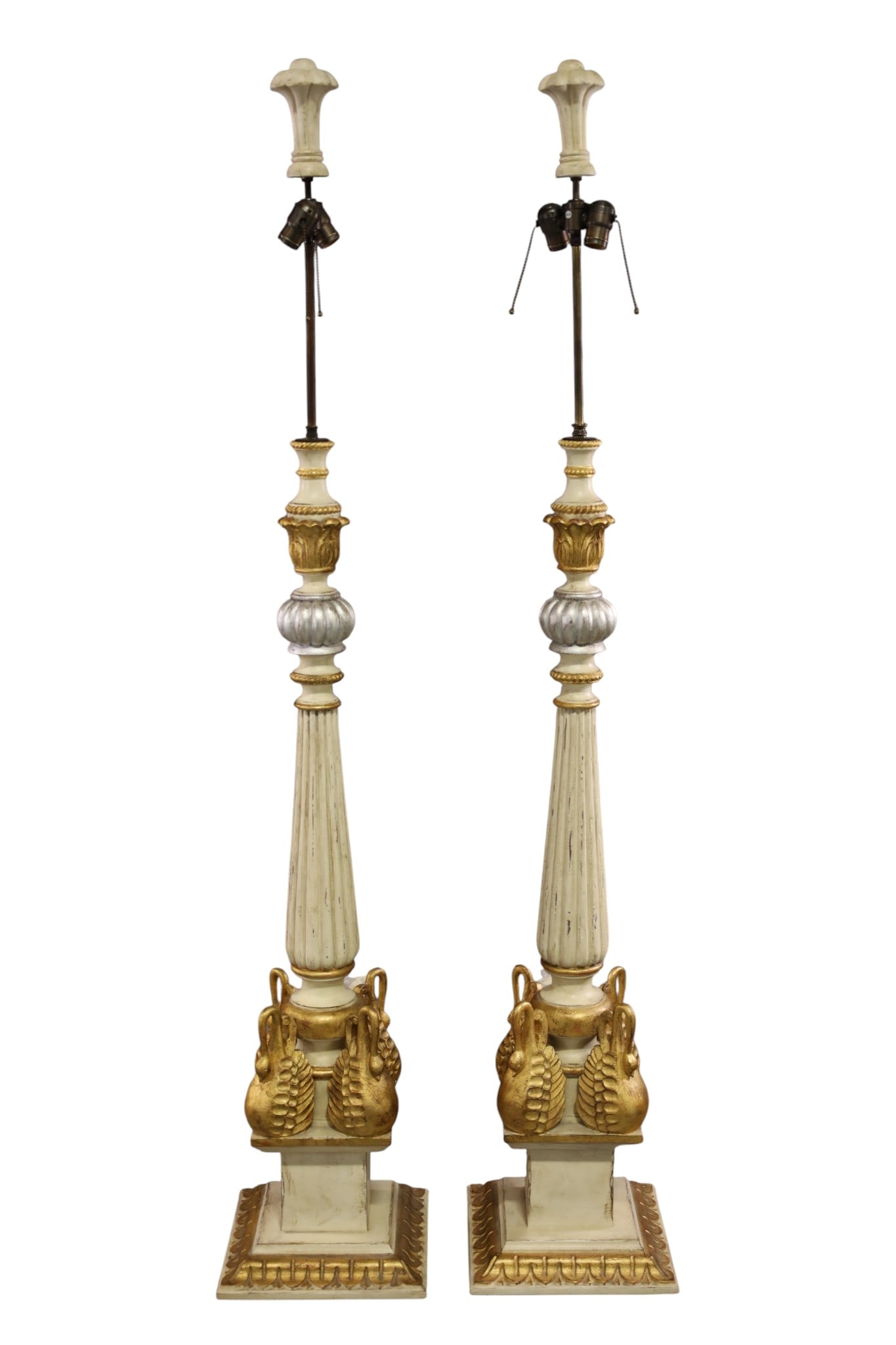 PAIR OF TALL PAINTED FINISH FLOOR LAMPS: PAIR OF LARGE CARVED, PAINTED FINISH FLOOR LAMPS, DOUBLE SOCKET, SWAN FORM BASE. SOME PAINT LOSS. 68" H. THIS ITEM EXCEEDS SIZE LIMITATIONS FOR IN HOUSE SHIPPING, MUST BE PICKED UP IN HOUSE OR