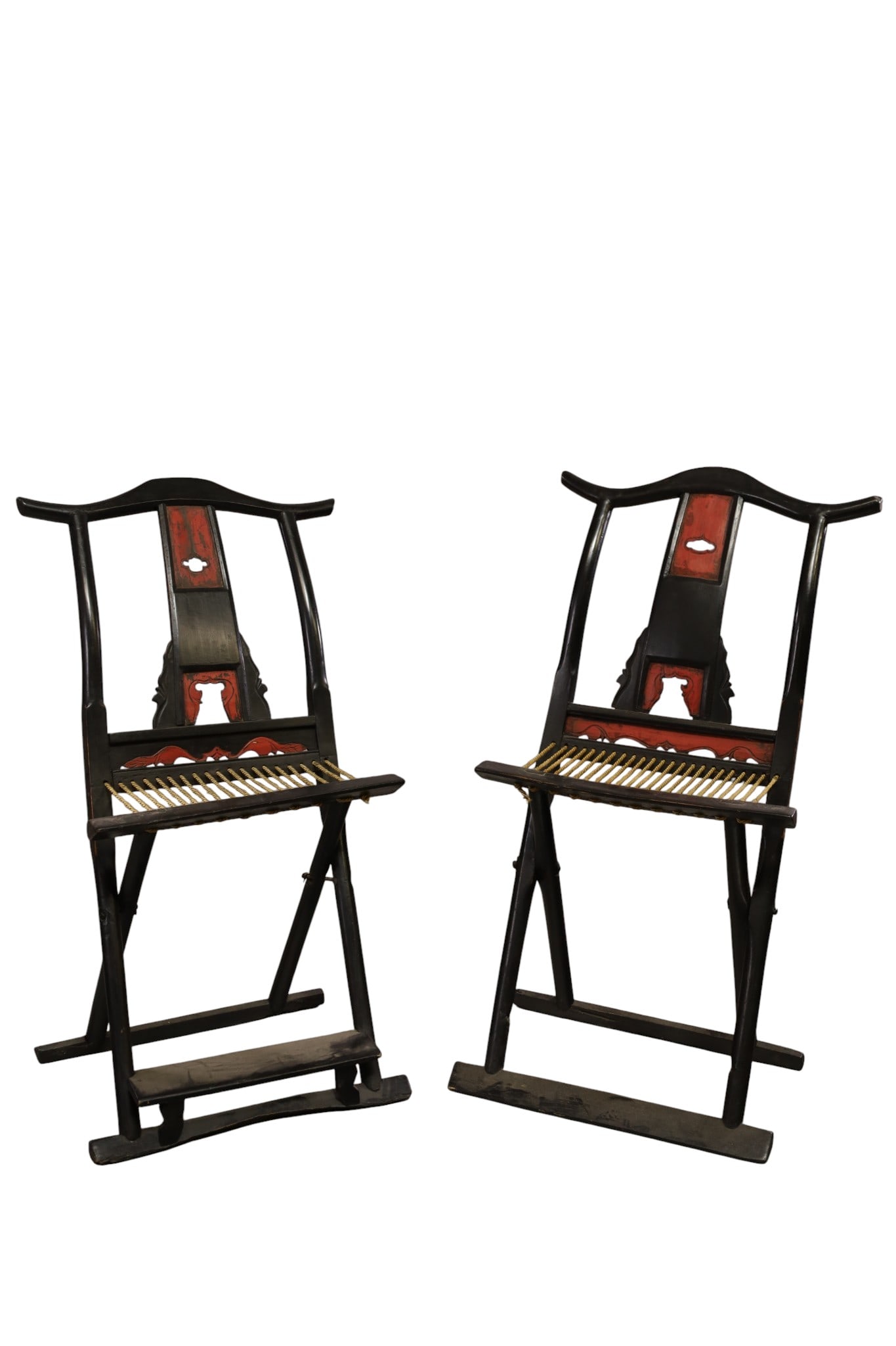 PAIR OF YOLK BACK FOLDING CHAIRS: PAIR OF CHINESE FOLDING YOLK BACK CHAIRS, ROPE SEATS. MISSING ONE FOOT REST. 22 1/2" W x 17" D x 42" H. THIS ITEM EXCEEDS SIZE LIMITATIONS FOR IN HOUSE SHIPPING, MUST BE PICKED UP IN HOUSE OR SHIPPED