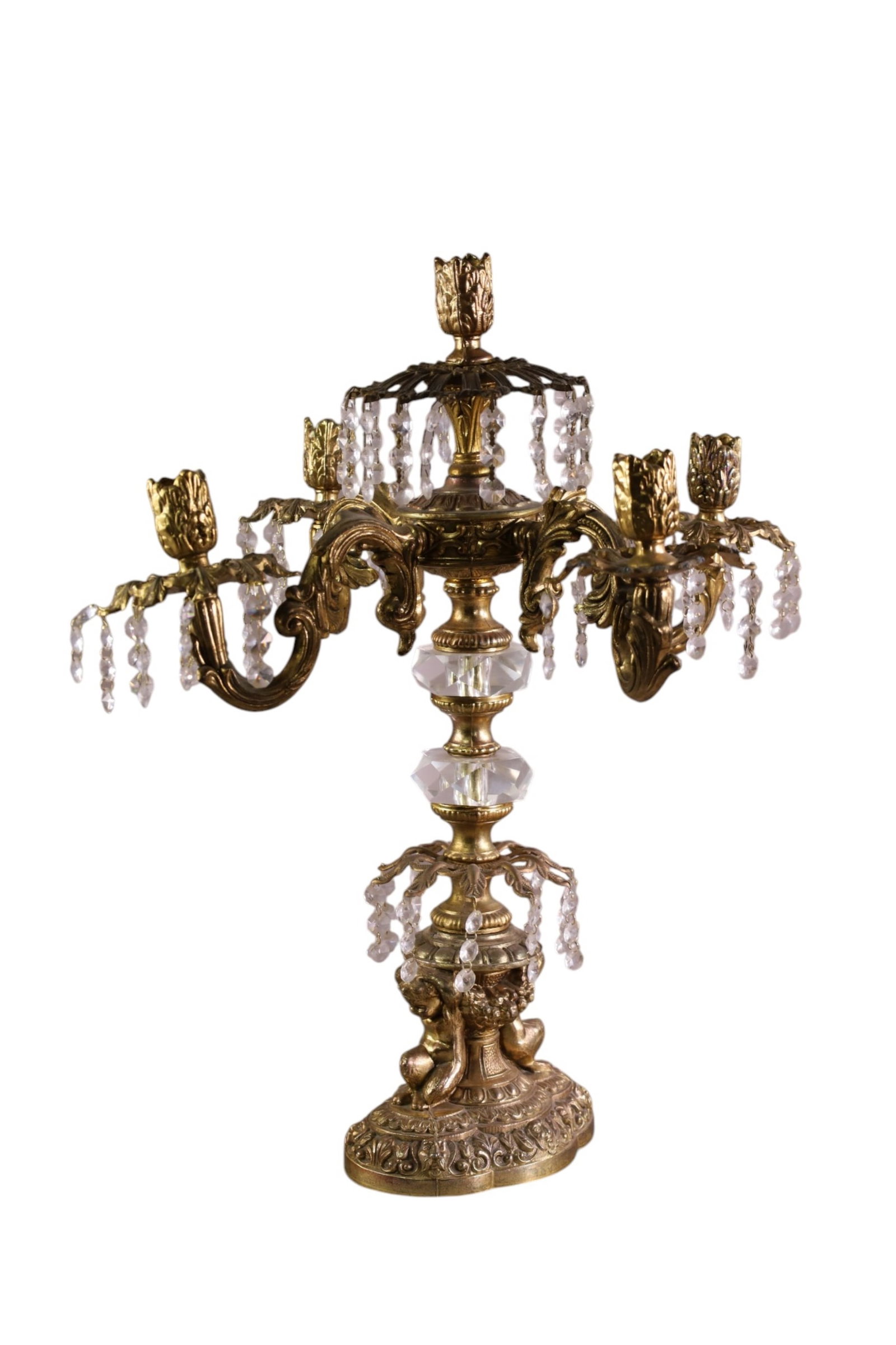 FIGURAL CANDELABRA: FIGURAL CRYSTAL AND SPELTER 5 ARM CANDELABRA, SMALL CRYSTAL PRISMS, SMALL BREAKS TO METAL. 21 1/2" H.