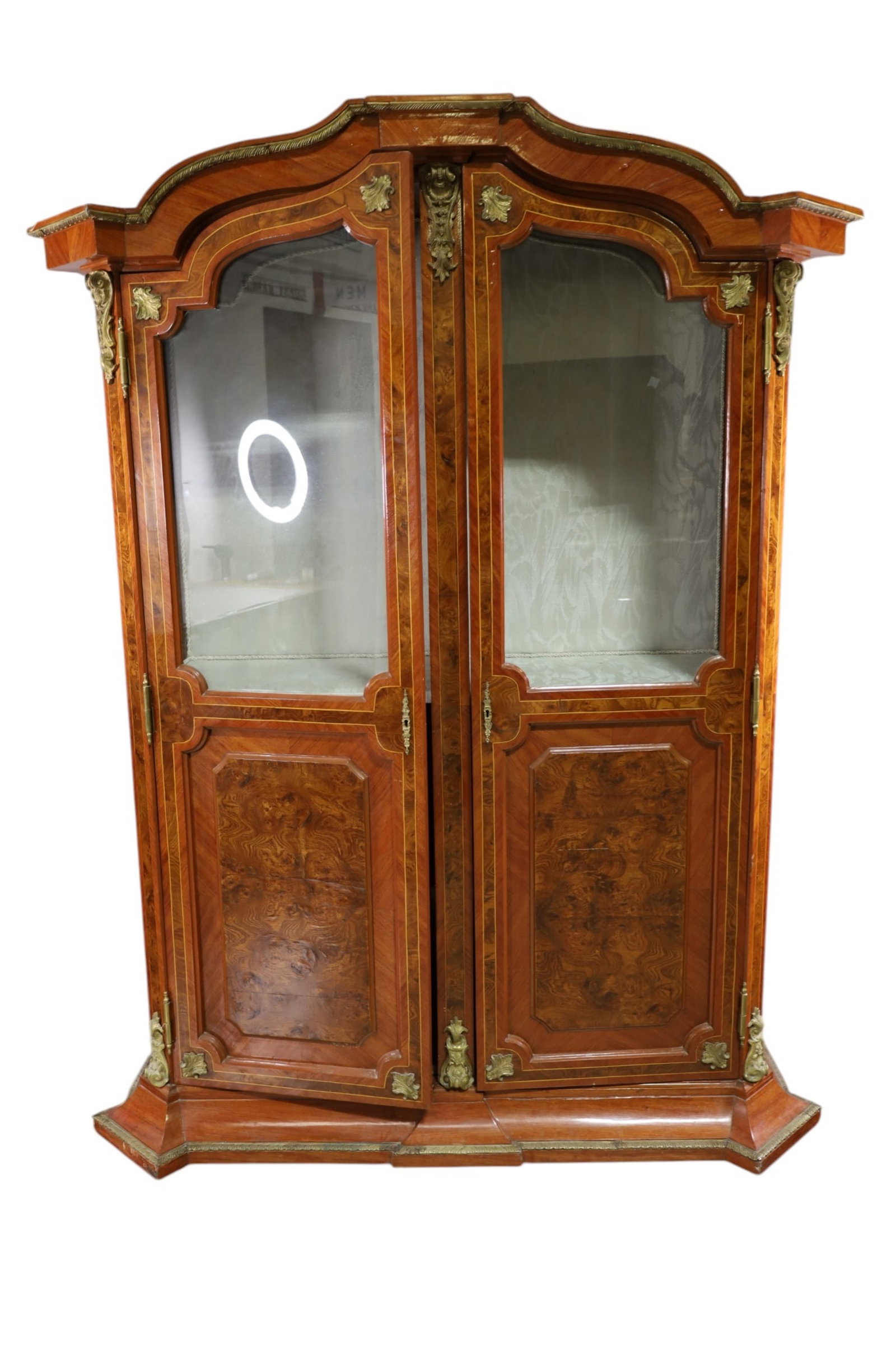 LARGE FRENCH STYLE CABINET: LARGE TWO DOOR FRENCH STYLE CABINET, FABRIC LINED, MISSING TOP INTERIOR SHELVES. CHIP TO TOP LEFT. NO KEY. 66" W x 26" D x 84" H. THIS ITEM EXCEEDS SIZE LIMITATIONS FOR IN HOUSE SHIPPING, MUST BE