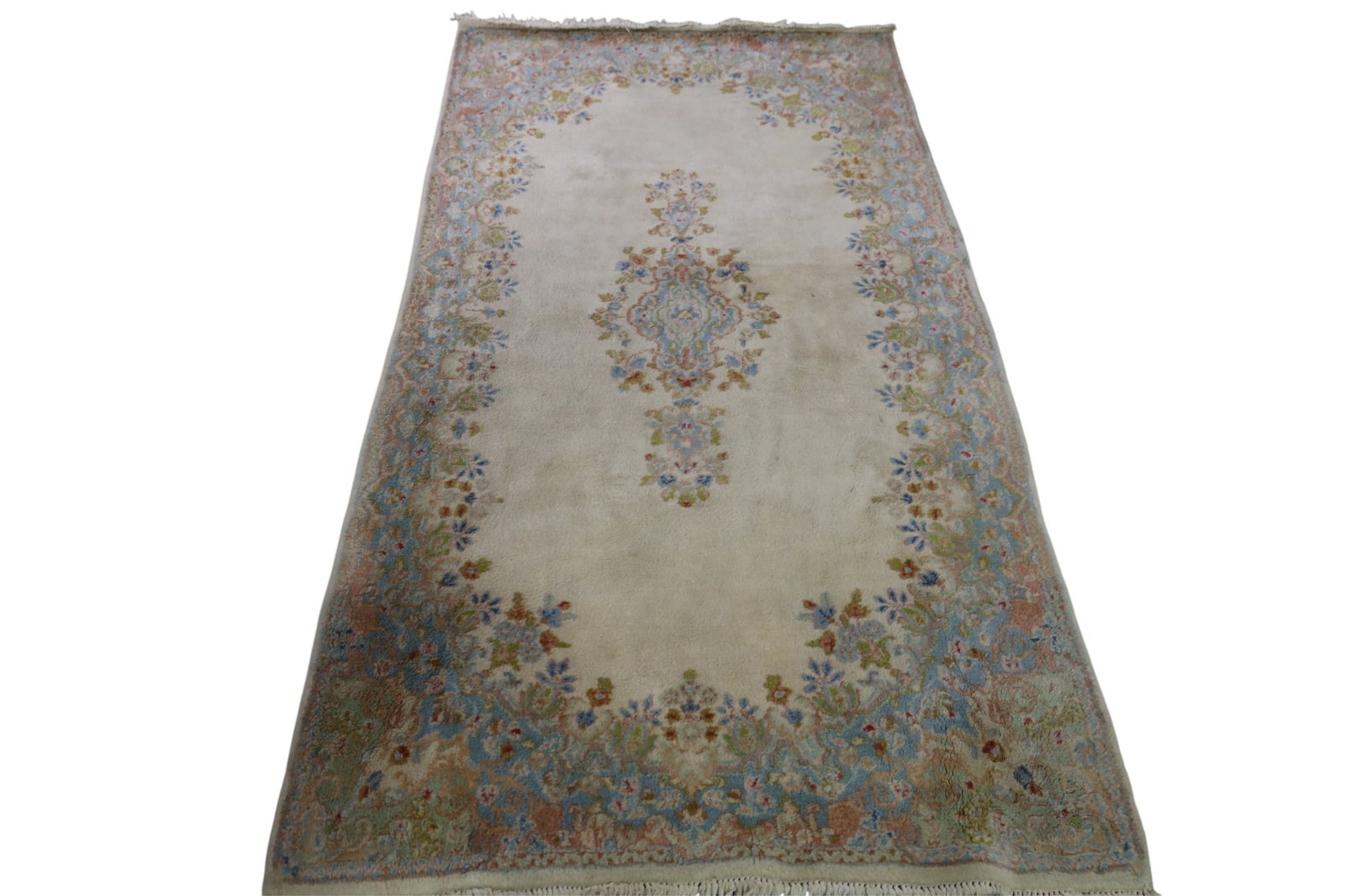 APPROX 7' 3" x 4' HANDMADE WOOL RUG: HANDMADE KIRMIN WOOL RUG.
