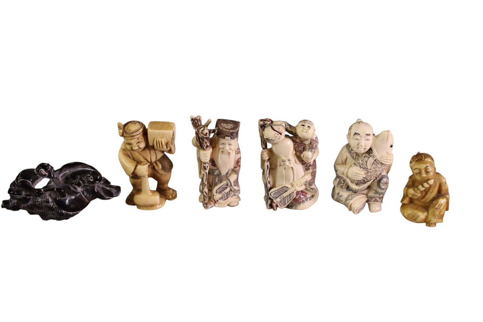 6 CHINESE NETSUKES: 6 CHINESE CARVED BONE NETSUKES,
